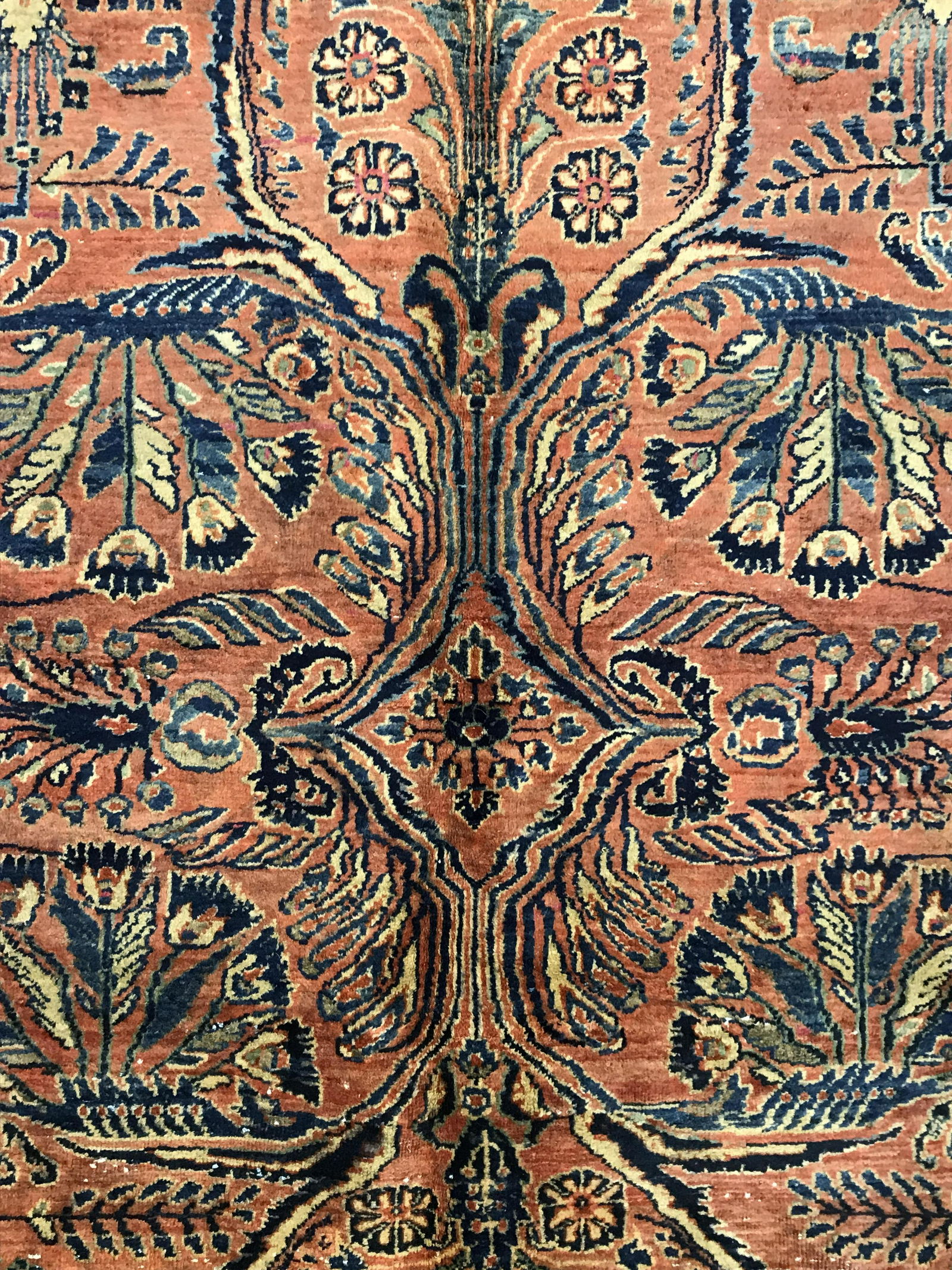 Vintage Handmade Persian Wool Carpet: Vintage, possibly antique, Persian carpet. Fringes are worn, decorated with intricate multi toned floral and vine like patterns. Measures approx 148 inches Long, and 107 inches W. Wear is consistent w