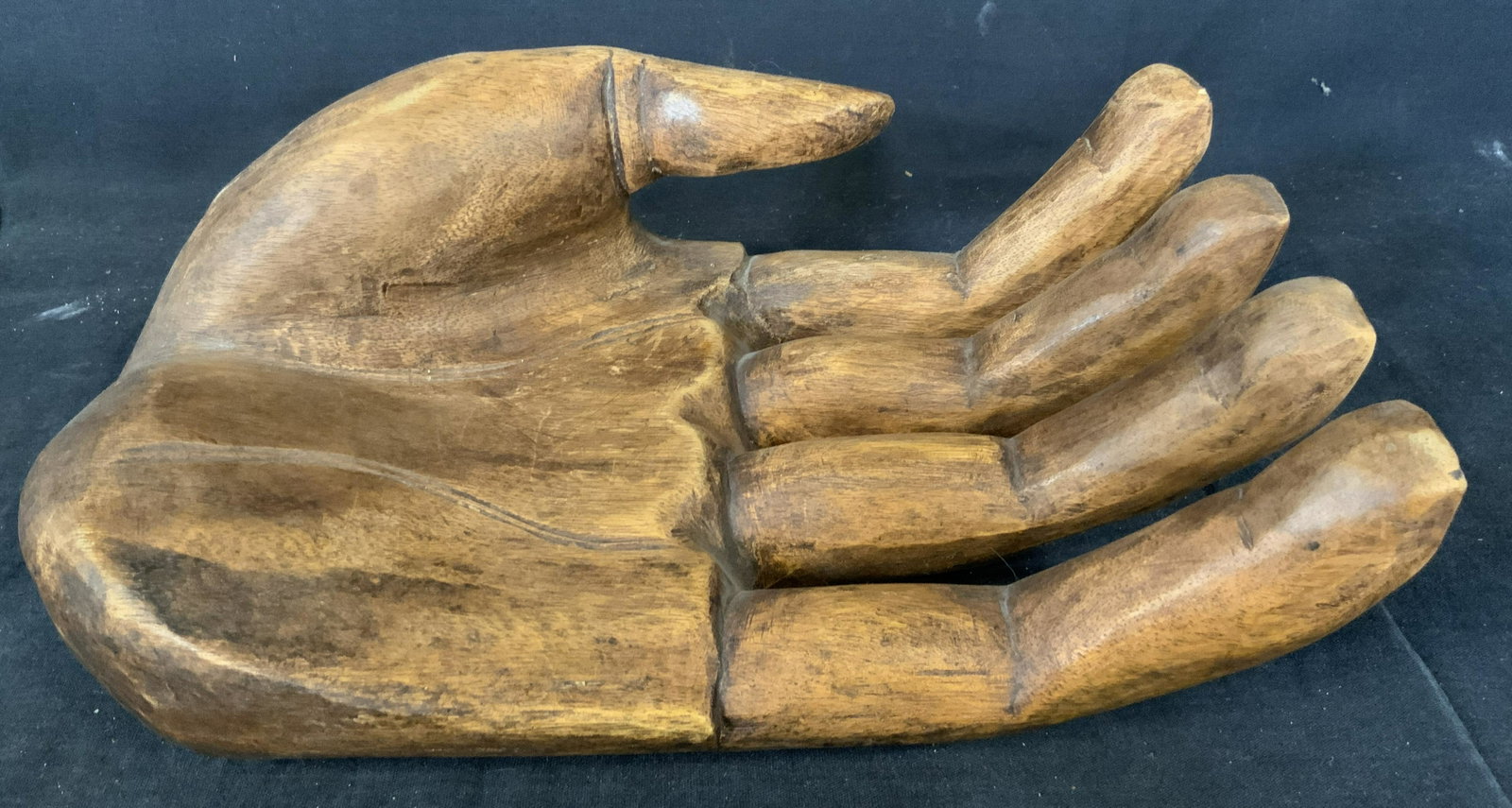 Wooden Hand Figural Sculpture, Indonesia: Wooden Hand Figural Sculpture, Indonesia, label to base reads ‘Made in Indonesia’, measures 4 3/8 inches tall x 12 1/2 inches at widest point, some surface wear but overall in good condition, Scul