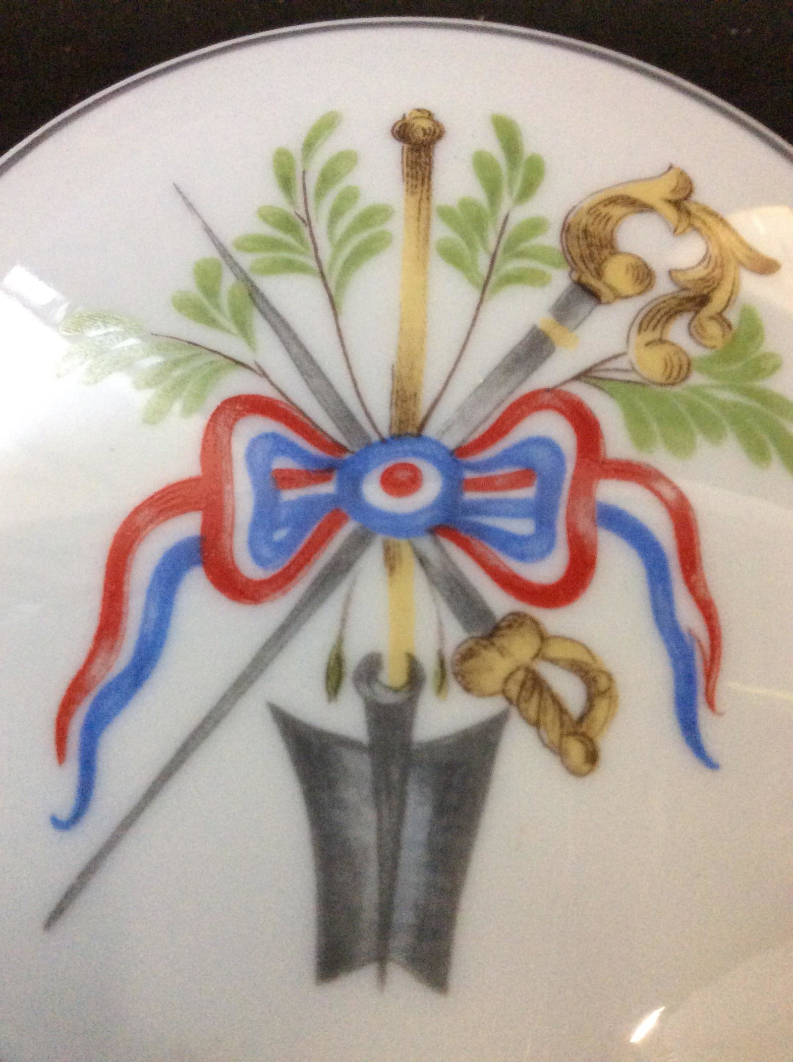 Porcelain Trinket Box, For Lancôme by LIMOGES: Collectible Round Trinket Box, Bicentennial Anniversary Of French Revolution , 1789 - 1989. French Flag colors in Ribbon wrapped around revolutionary combat symbols. Underside Hallmarked, includes M. 