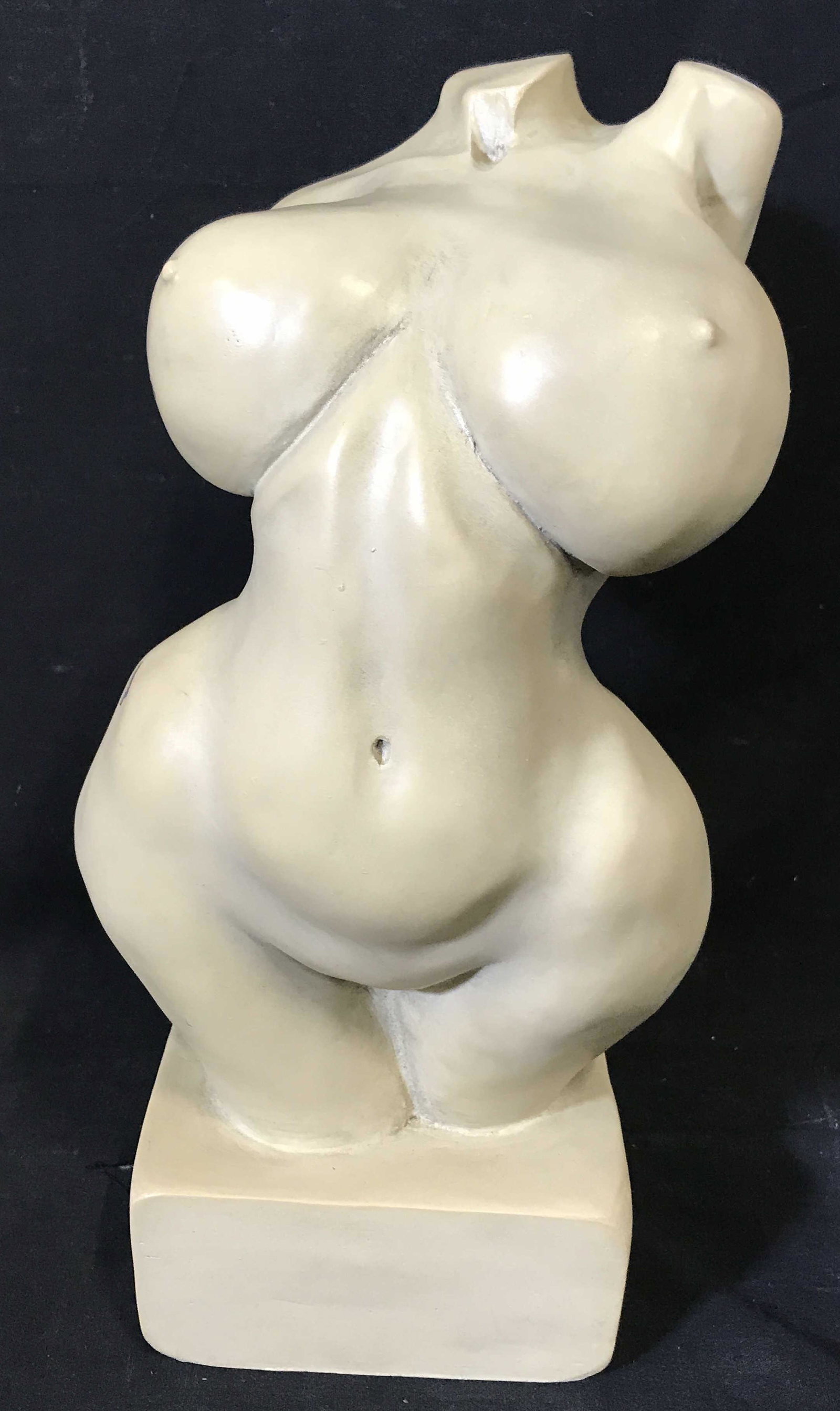 White Madame Opulenz Female Nude Figural: White Madame opulenz Figural, made of a composite material, piece depicts a female body with enlarged breasts and buttocks in a mimicry of modern fertility figures, piece attached to its base with an 