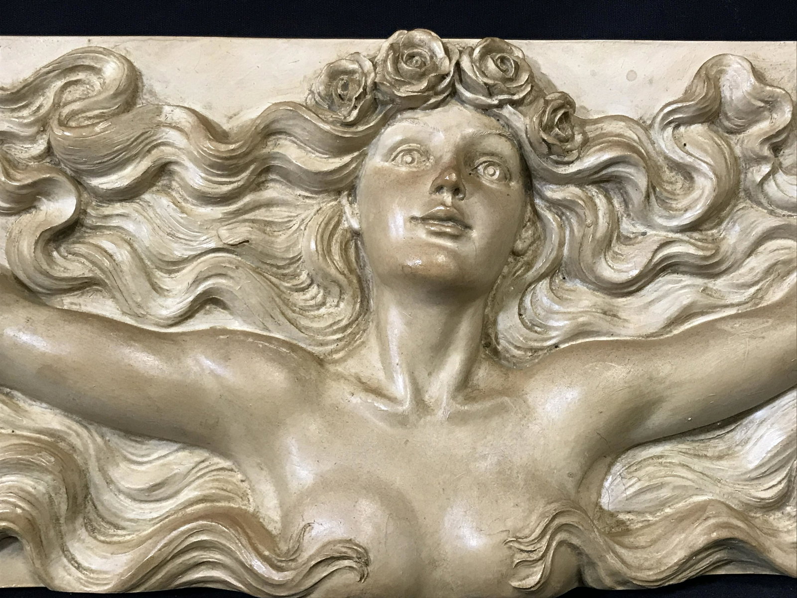 TOSCANO Composite Female Nude Wall Artwork: Toscano composite female nude wall artwork, subject the top half of a nude female with hair flowing behind her and flowers falling around her, label to reverse reads ‘European Styled Sculpture Hand 