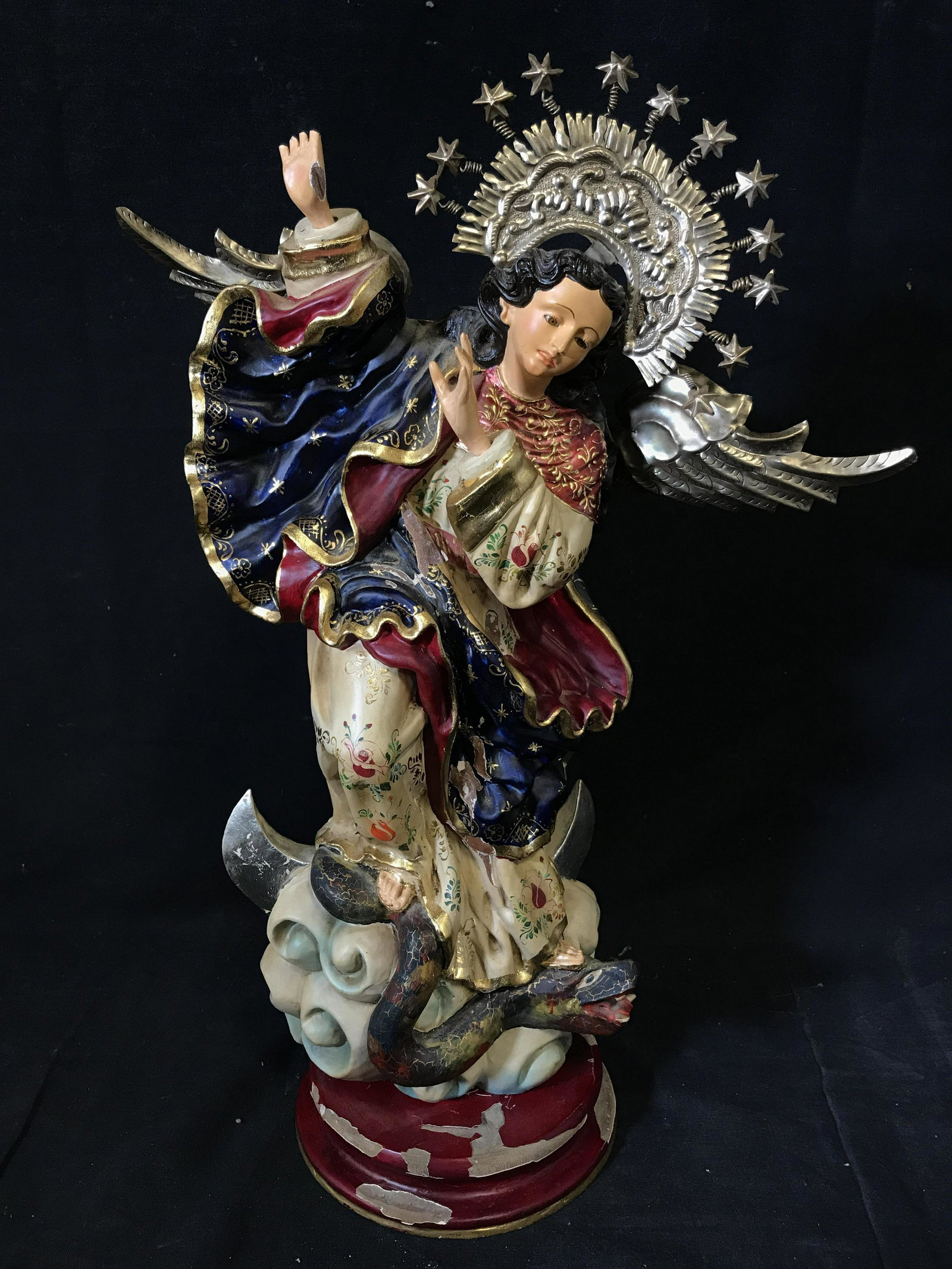 Asian Style Wooden Angel Sculpture: Asian style wooden angel sculpture, no apparent signatures or stamps, subject a female angelic figure in long flows robes and sandals standing atop a snake in a cloud, piece is entirely made of hand p