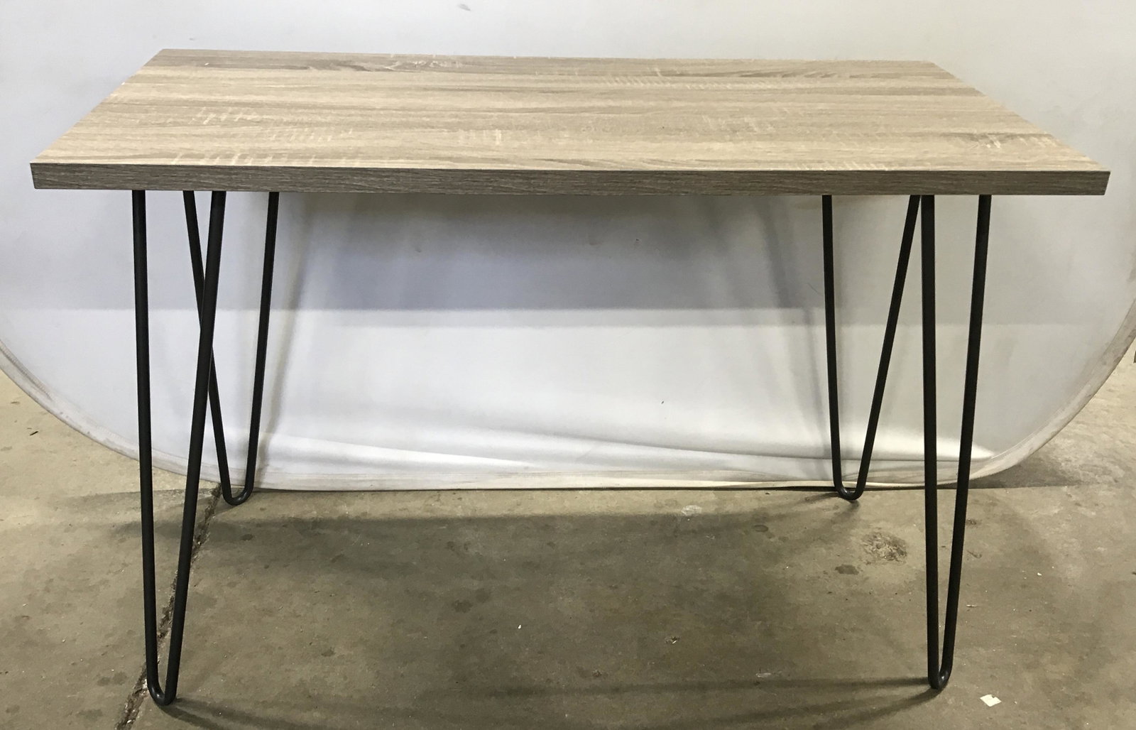 Wood Topped Industrial Modern Table: Wood topped table. Legs are metal, hairpin legged table. Measures approx 27 inches H, 40 inches W, and 19.5 inches deep. Industrial table, industrial modern, modern furniture, contemporary, veneer, wo