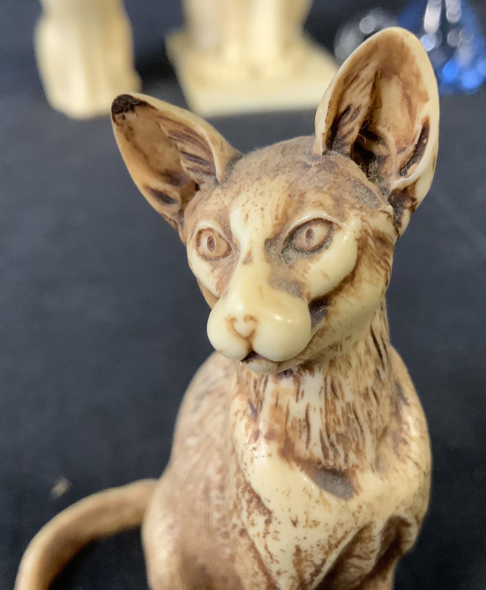 Lot 4 Cat Figurines: Lot 4 Cat Figurines, no apparent inscriptions or stamps, comprised of glass and composite materials, smallest cat measures 2 7/8 x 2 7/8 inches at widest point, tallest cat measures 6 7/8 x 4 1/4 inch