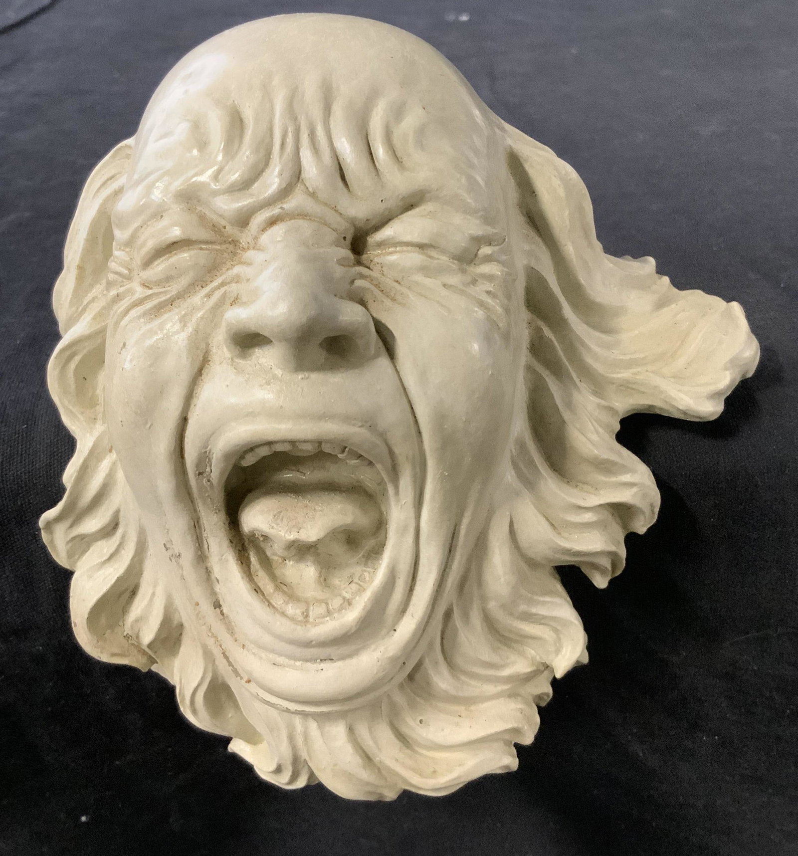 TOSCANO Composite Yelling Man Sculpture: TOSCANO Composite Yelling Man Sculpture, label reads ‘Toscano Design’, subject a screaming man, measures 5 3/8 inches tall x 5 1/8 inches at widest point, in good condition, Toscano, sculpture, ar