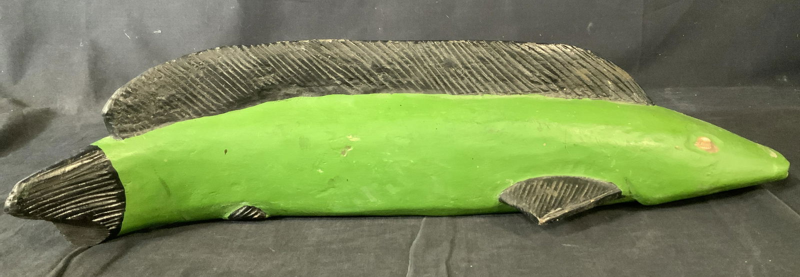 Green Bozo Fish Sculpture, Mali, West Africa: Green Bozo Fish Sculpture, Mali, West Africa, no apparent inscriptions or signatures, hand carved wood with black and green pigment, embedded cowrie shell eyes, measures 19 5/8 x 4 3/4 inches wide, so
