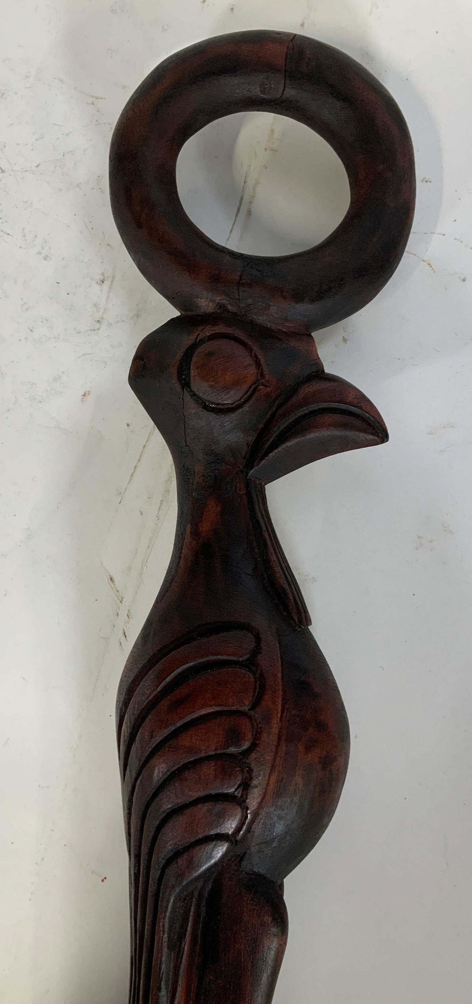 Bamileke Traditional Cane, Cameroon: Bamileke Traditional Cane, Cameroon, no apparent inscription or signatures, hand carved from singular block of wood, stylized bird figure, measures 42 1/2 x 6 inches at widest point, some surface wear