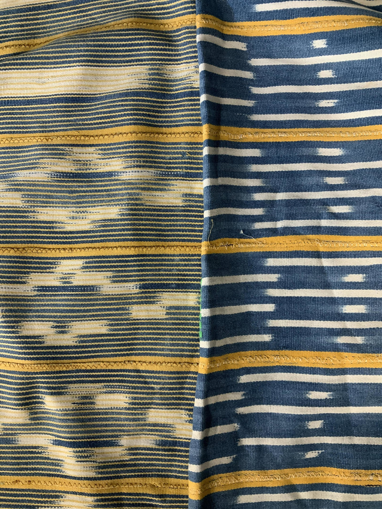Lot 2 Vintage West African Textiles: Lot 2 Vintage West African Textiles, no apparent inscriptions or labels, possibly from Mali, Burkina Faso, or Ivory Coast, multicolored striped pattern, one fabric measures 59 x 43 inches, fabric with
