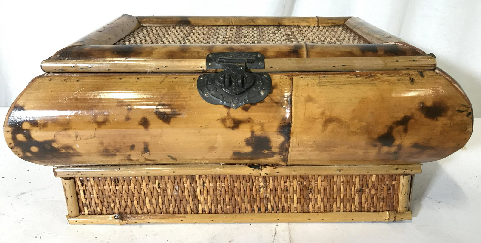 Vintage Asian Style Wooden Trinket Chest: Vintage, wooden trinket chest. Handles and clasp are crafted from metal. Measures approx 7 inches H, 15.25 inches W, and 10.25 inches deep. Wear is consistent with age and use, some joints have loosen