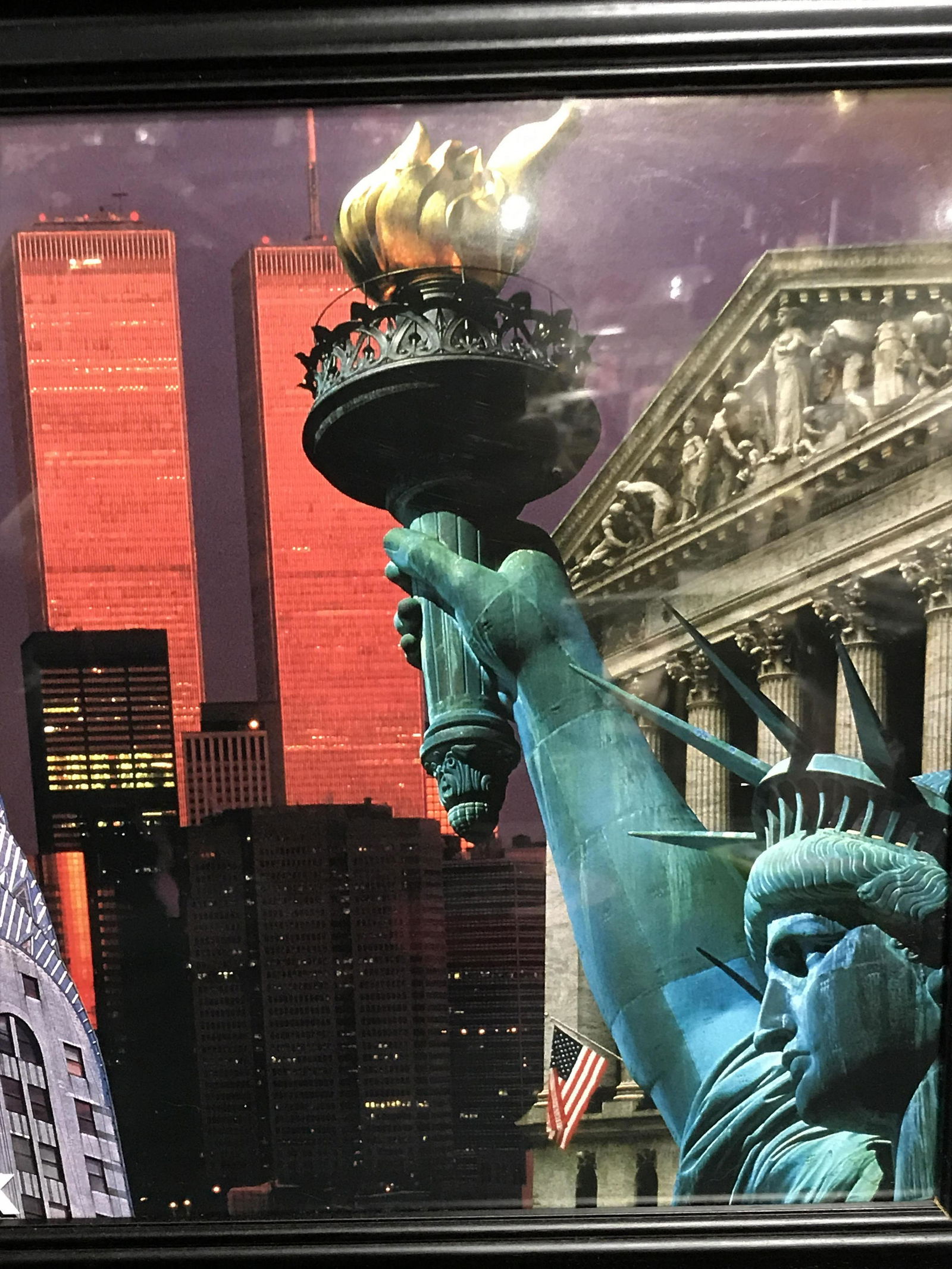 Framed Digital Collage Print of New York City: Framed digital collage print of New York City, text to lower border reads ‘New York-New York’, subject a collage of different views and landmarks known of NYC, matte black wooden frame, measures 1