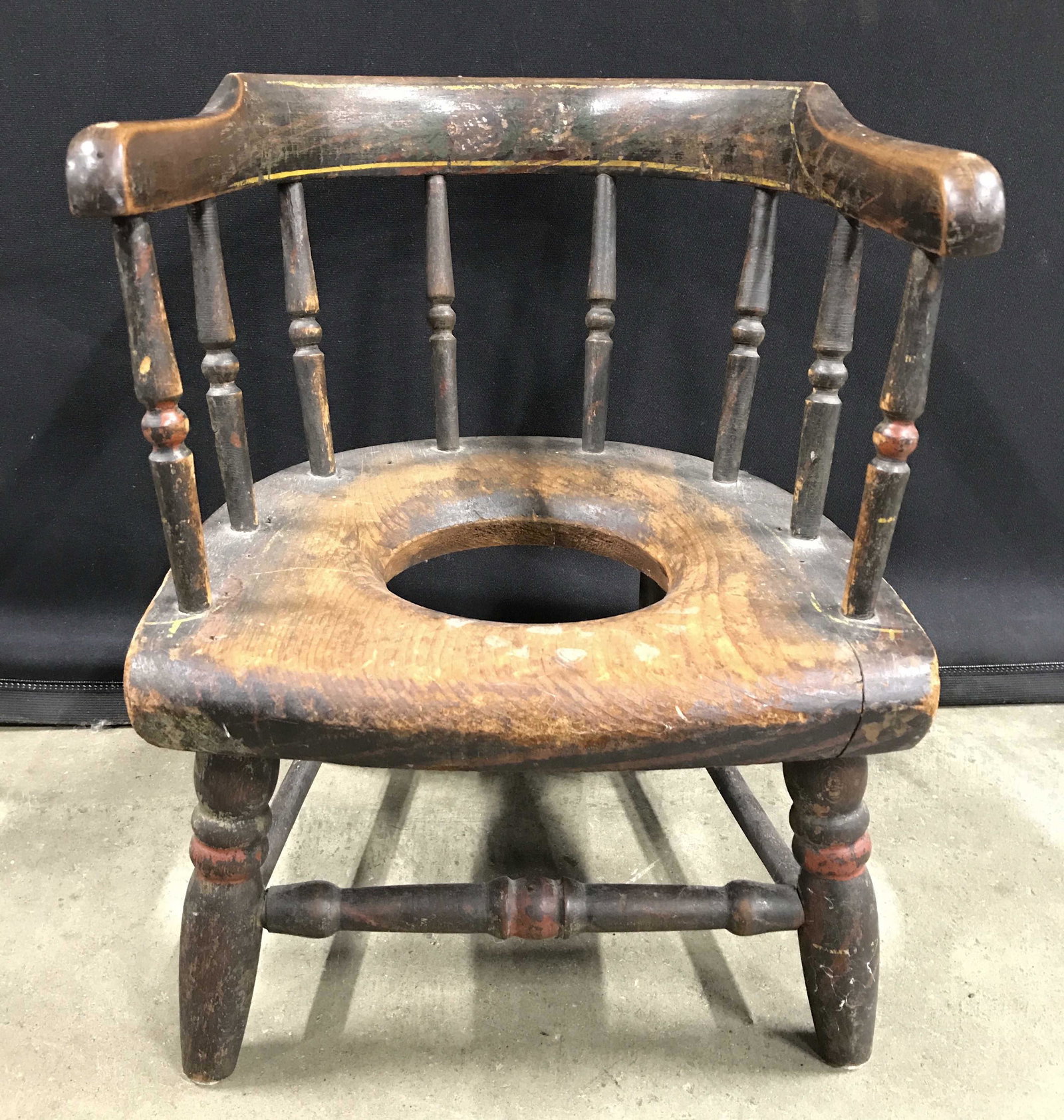 Antique Children’s Carved Wooden Toilet Chair: Children’s toilet chair is petite in size. Piece has curved horseshoe style backrest. Chair legs have stretchers in between. Measures approximately 15 inches tall 12 inches deep and wide. Toilet cha