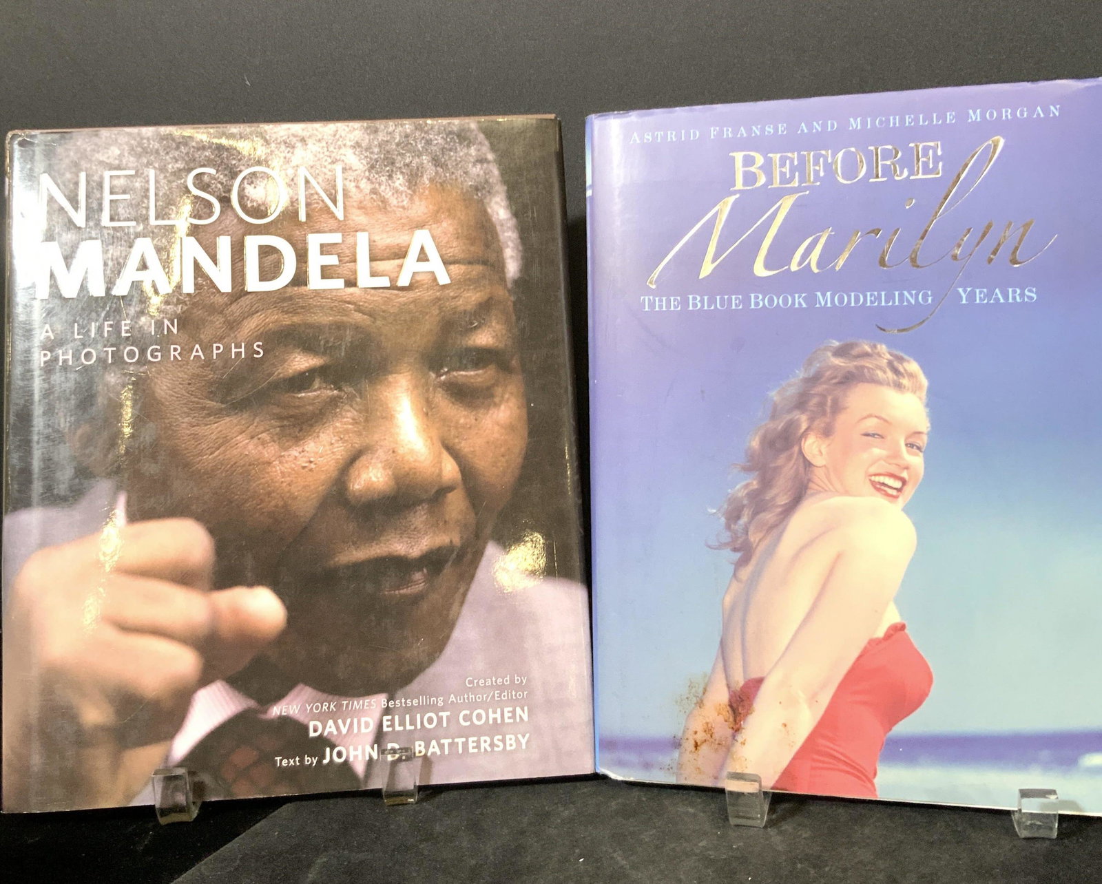 Lot 2 Books Nelson Mandela, Marilyn Monroe: Two hardcover books with photographs and text about Nelson Mandela & Marylin Monroe. Titles include Before Marylin: The Blue Book Modeling Years & Nelson Mandela, A Life in Photographs. Authors includ