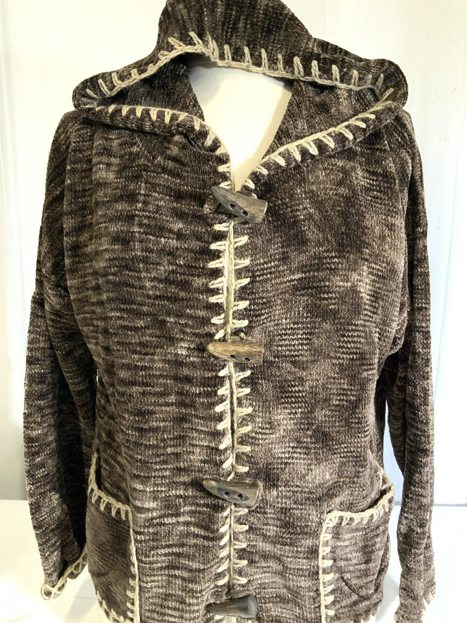DESIGNER SEARIE BLATT Hooded Plush Cardigan Jacket: Luxury Designer SEARIE BLATT Long sleeve button cardigan jacket. Textile soft Hans, plush viscose. Heather Brown color. Detailed wool yarn triangle edges throughout and wood ‘ horn’ buttons, butto