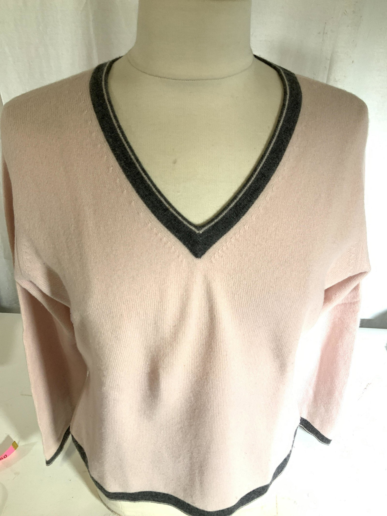 FORTÉ PINK CASHMERE PULLOVER SWEATER: Classic pullover swear, simple in style. Light pink with grey V neck. Designer label attached. Size L. Straight hems. 22 in. Long. Designer FORTÉ Sweater, FORTE pink cashmere pullover, Luxury Cashmer