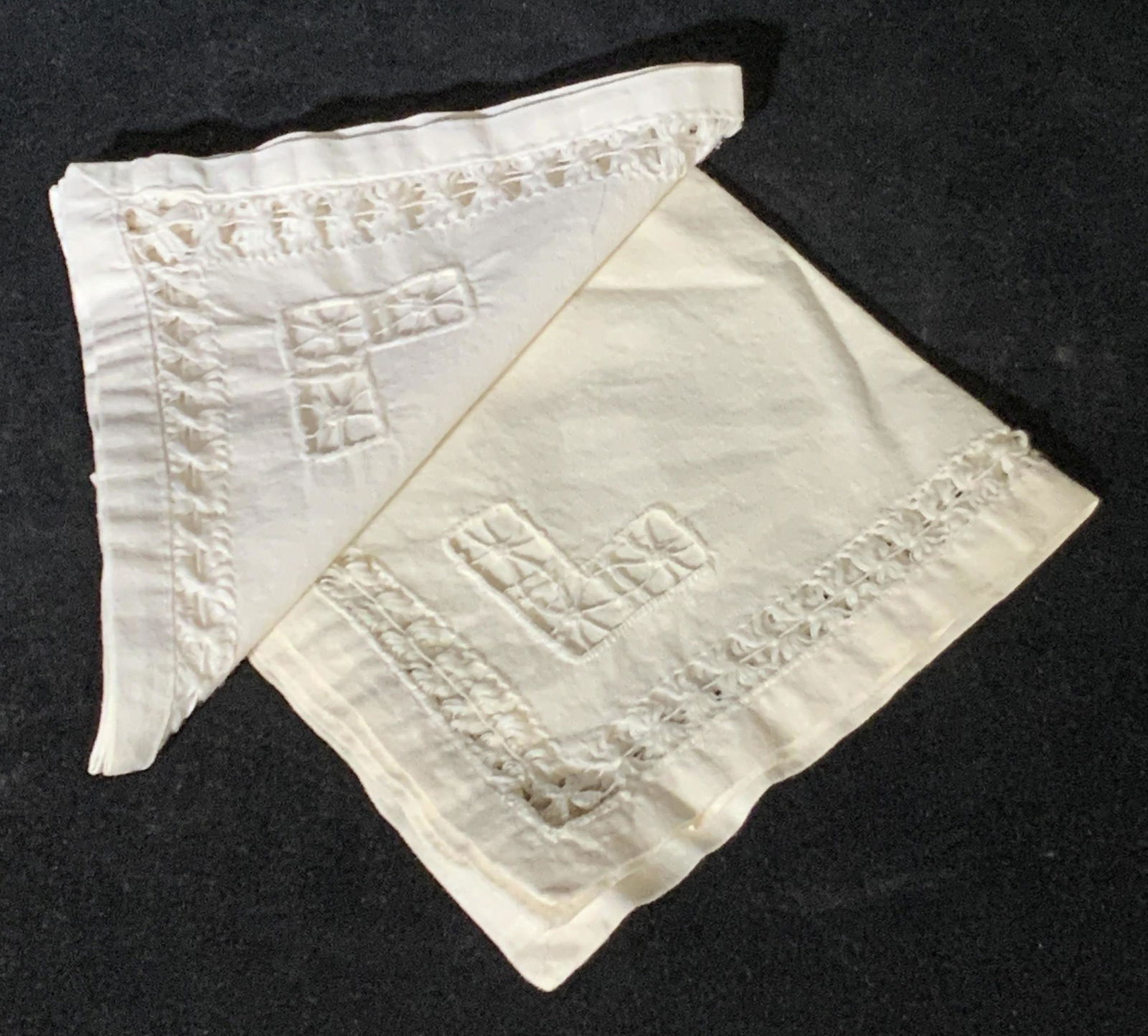 Lot7 Vntg Collect. Embroidered White Table Linens: 7 vintage table linens / napkins. Possibly antique French linens. Two of the seven have embroidered floral designs with pierced linen accents. The other five have embroidery & pierced linen, but their