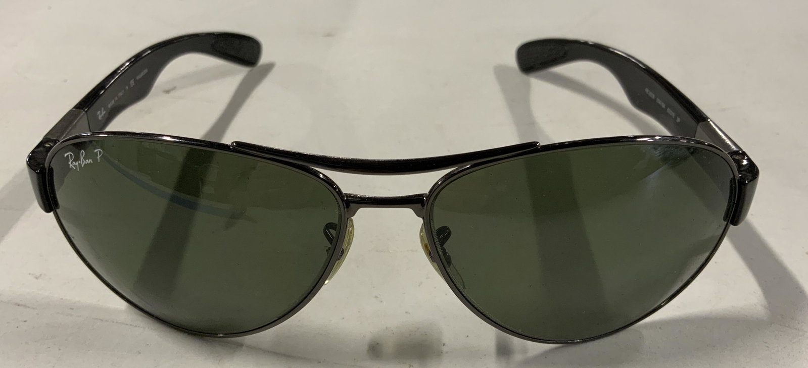 RAY BAN RB3509 Polarized Sunglasses: RAY BAN RB3509 Polarized Sunglasses, inscription reads ‘Ray Ban P’, inscription to arms reads ‘RB3509 004/9A 63 15 3P’ and ‘Ray Ban Made in Italy R CE Polarized’, measure 5 3/4 inches wide