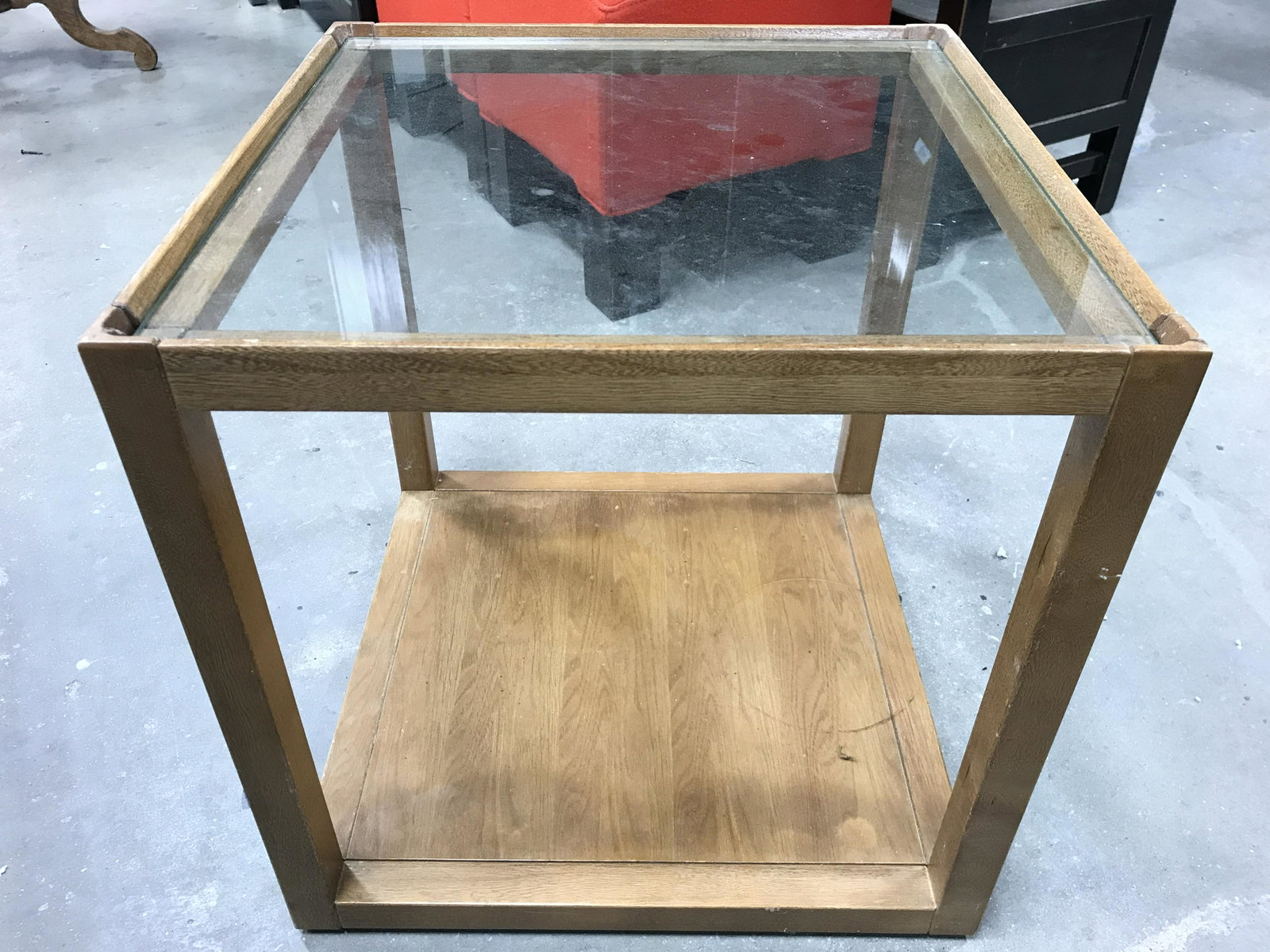 Vintage Wooden Side Table W Glass Top: Side table is wooden. Piece has cube shape. Table top is glas. Piece measures approximately 18.5 inches tall wide and deep. Side table, end table, wooden side table, accent table, occasional table, cu