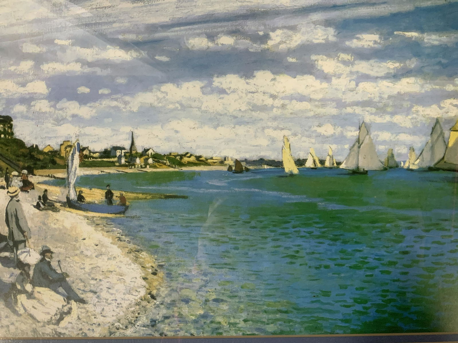 CLAUDE MONET Regatta at Sainte-Adresse Lithograph: CLAUDE MONET Regatta at Sainte-Adresse Offset Lithograph, inscription to lower left reads ‘Claude Monet’, subject people sitting on a beach with boats in the distance , measures 19 x 22 3/4 inches