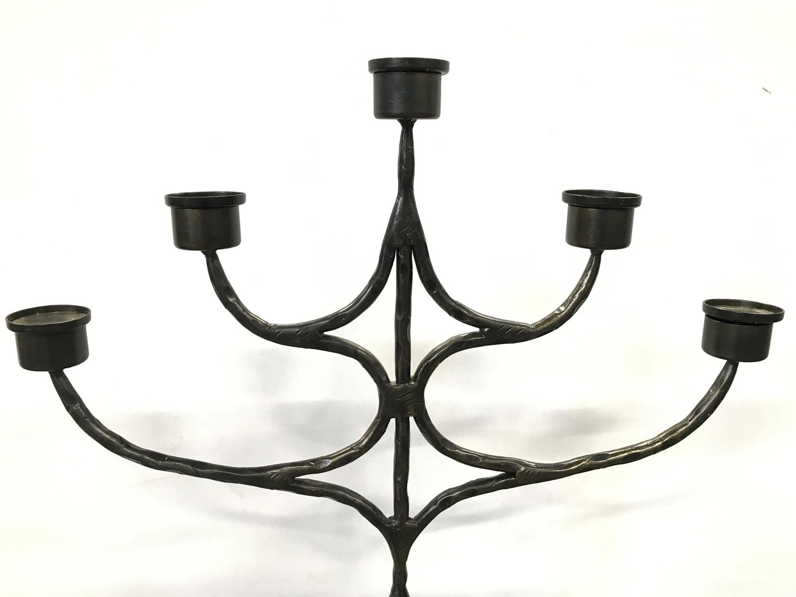 Antique Iron Floor Size Candelabra Altar Candle: Candelabra is antique. Piece is iron and floor sized. Candelabra is footed with 4 feet. Piece has 5 arms. Candelabra, iron candelabra, antique candelabra, floor size candelabra, altar candle. Property