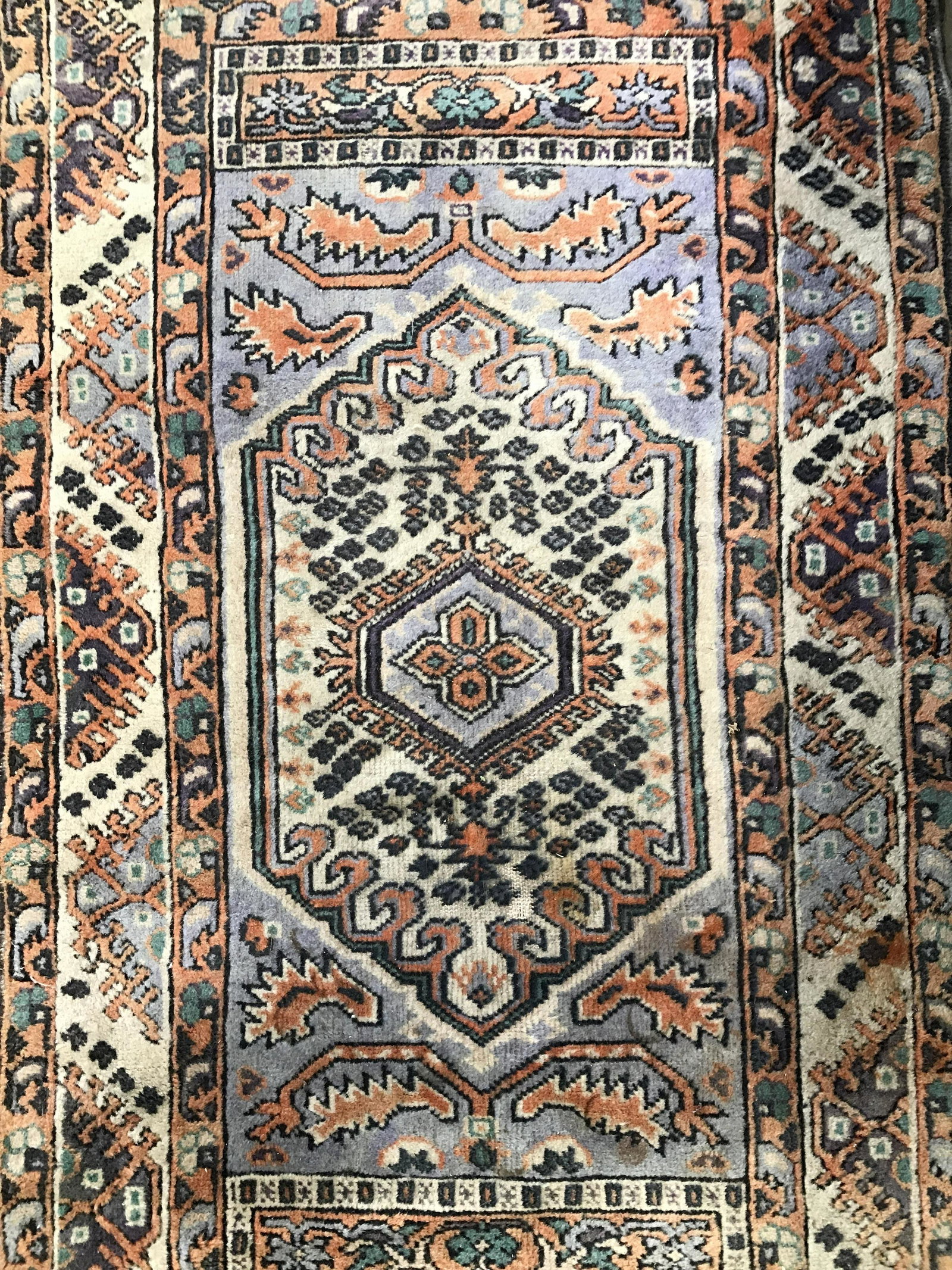 Vintage Handmade Fringed Wool Rug: Rug is handmade and wool. Piece is vintage possibly antique. Piece is fringed. Rug is possibly Turkish. Piece contains intricate multi toned geometric detail. Piece measures approximately 55 inches lo