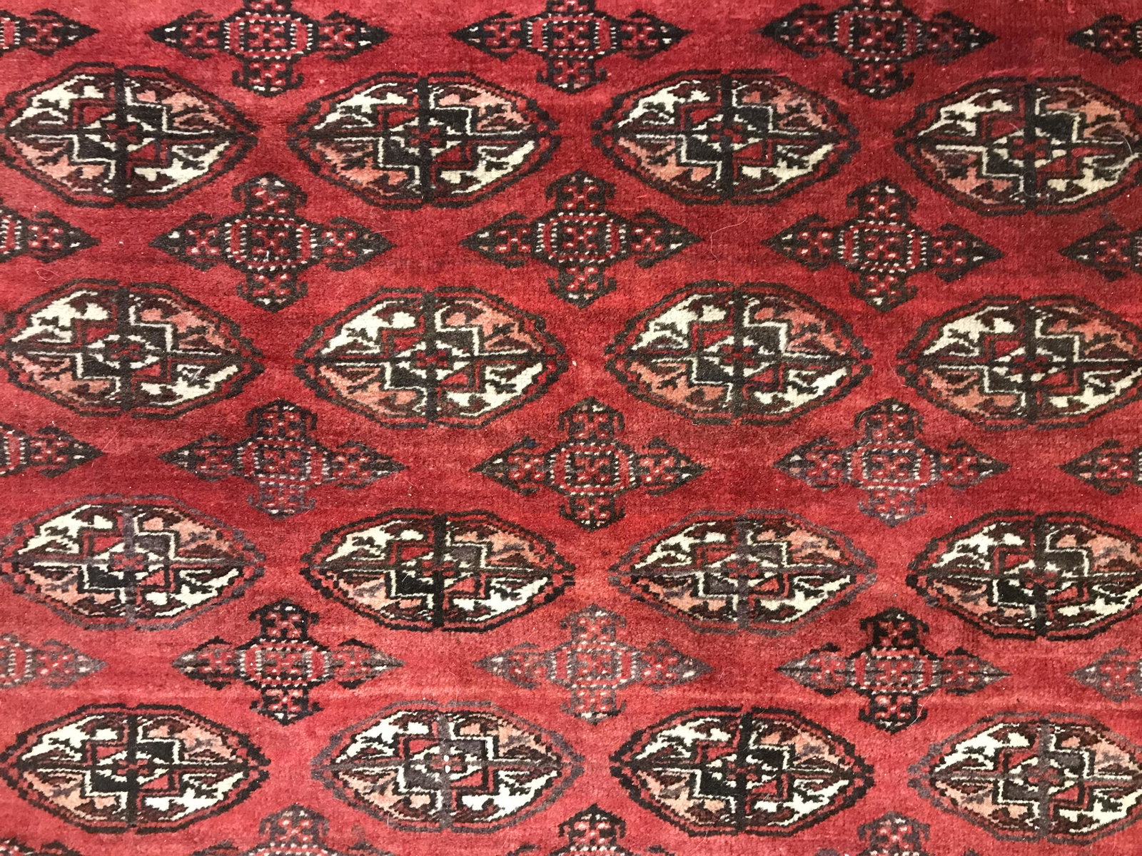 Vintage Handmade Caucasian Wool Rug: Rug is wool and handmade. Piece is vintage possibly antique. Rug contains intricate multi toned geometric detail. Piece measures approximately 70 inches long 51 inches wide. Rug, carpet, area rug, woo