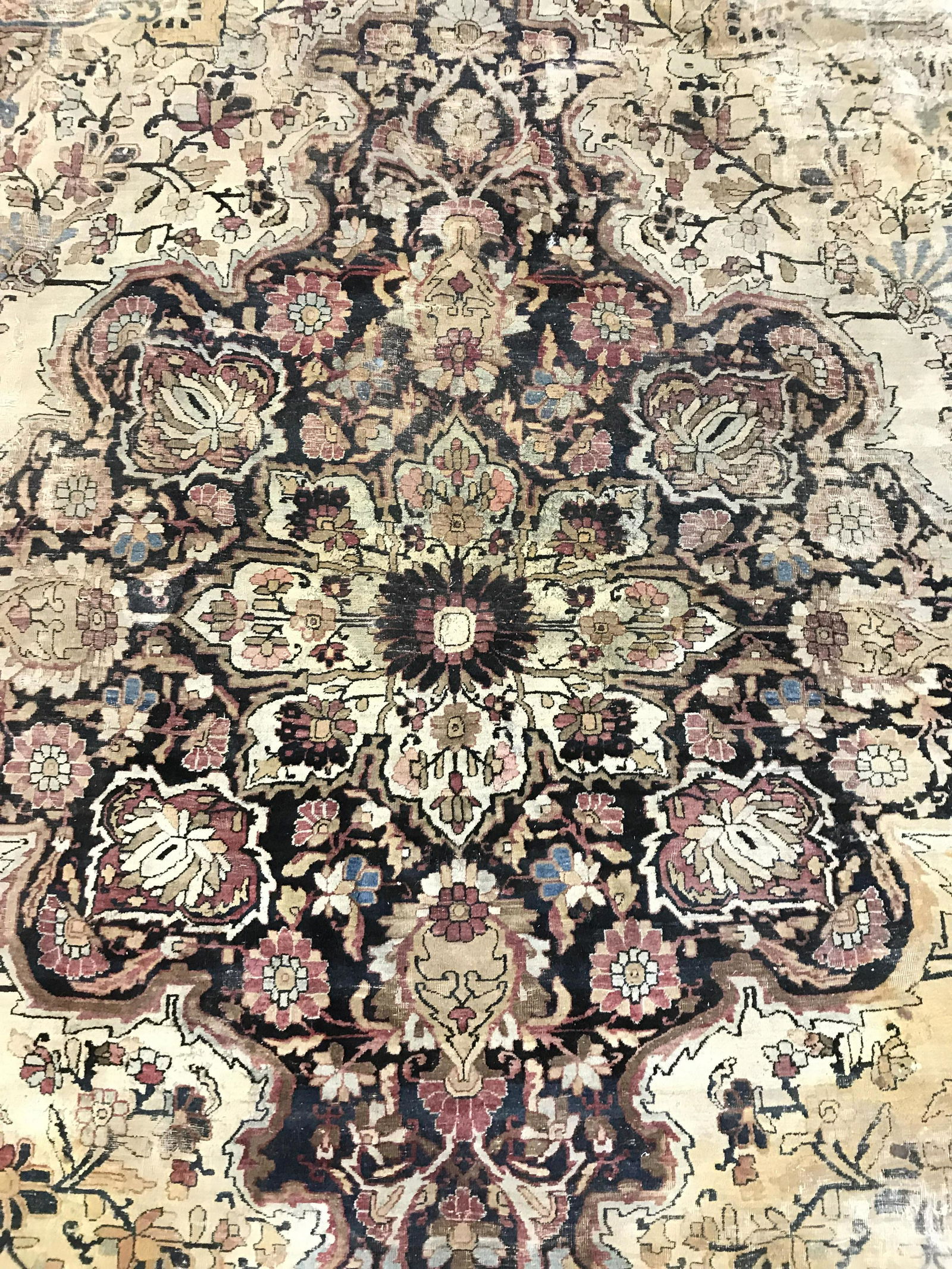 Antique Handmade Persian Wool Rug: Rug is handmade and wool. Piece is antique. Rug has intricate multi toned floral leaf vine and geometric detail. Rug, carpet, area rug, wool rug, handmade rug, antique rug, vintage rug, home furnishin