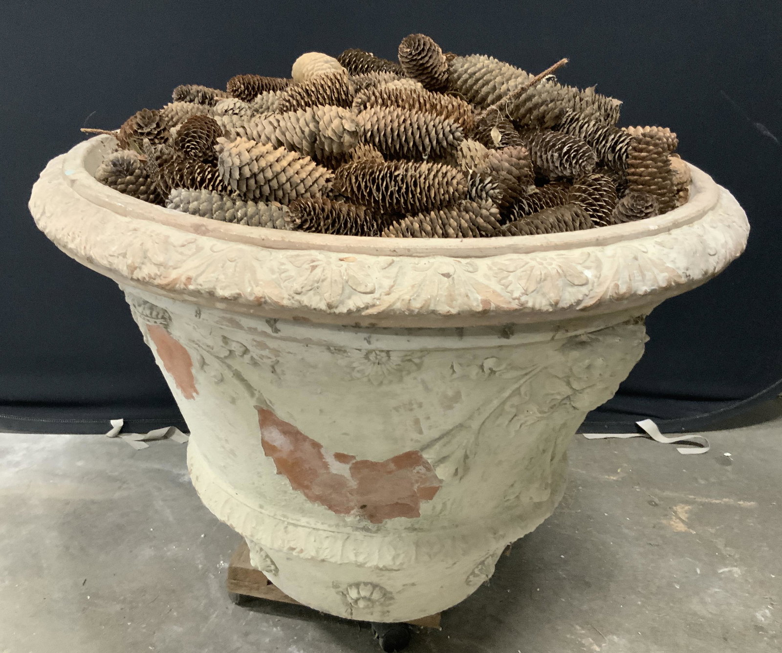 Large Vintage Earthenware Planter: Large, vintage, earthenware planter. Planter is decorated with the faces of women and floral designs. PIECE HAVE SIGNIFICANT WEIGHT. Wear is consistent with age and exposure. Loss is present on piece.