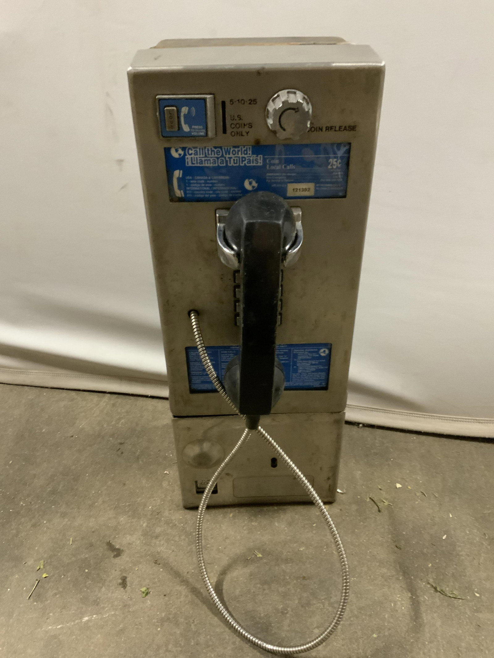 Vintage Payphone: Vintage payphone. Measures approx 21.25 inches H, 8 inches W, and 10.5 inches deep. Wear is consistent with age and use. Phone, payphone, phone booth, vintage collectible, corded phone, analog phone. 