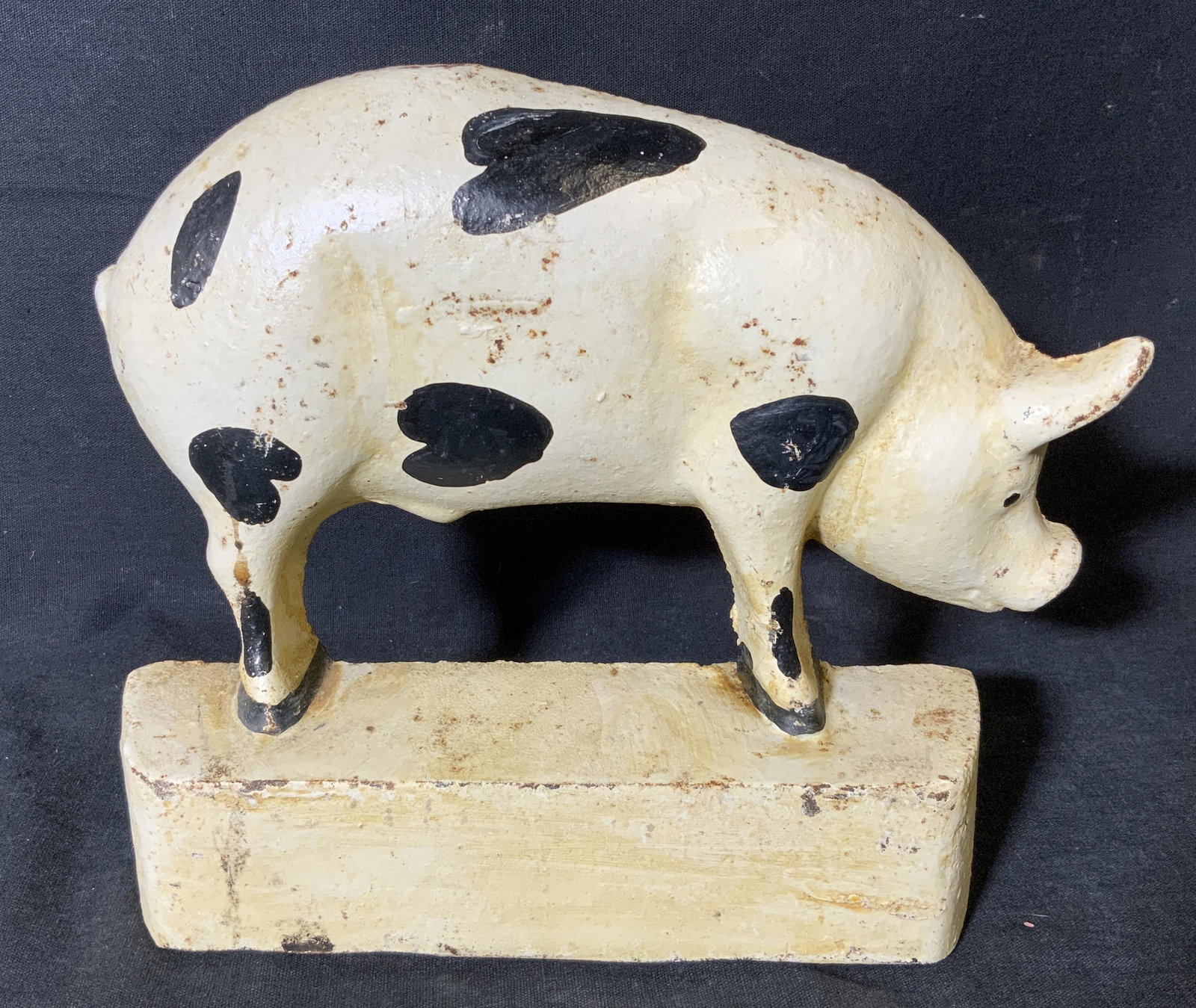 Vintage Hand Painted Cast Iron Pig Door Stop: Vintage Hand Painted Cast Iron Pig Door Stop, vintage possibly antique, no apparent inscriptions or signatures, subject a white pig with black spots standing atop a white block, some chips and wear to