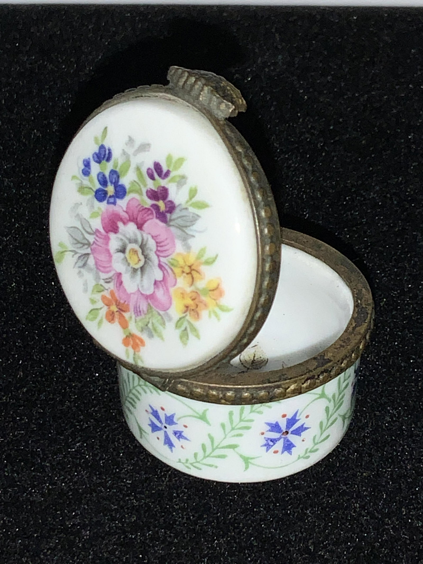 HALLMARKED FRENCH Vntg Porcelain Snuff Box: Hallmarked French Vintage Porcelain box. Hand painted porcelain, hallmark in blue ink on verso. Painted illustration of a colorful flowers on lid, open box to reveal a painted rose and painted bow on 
