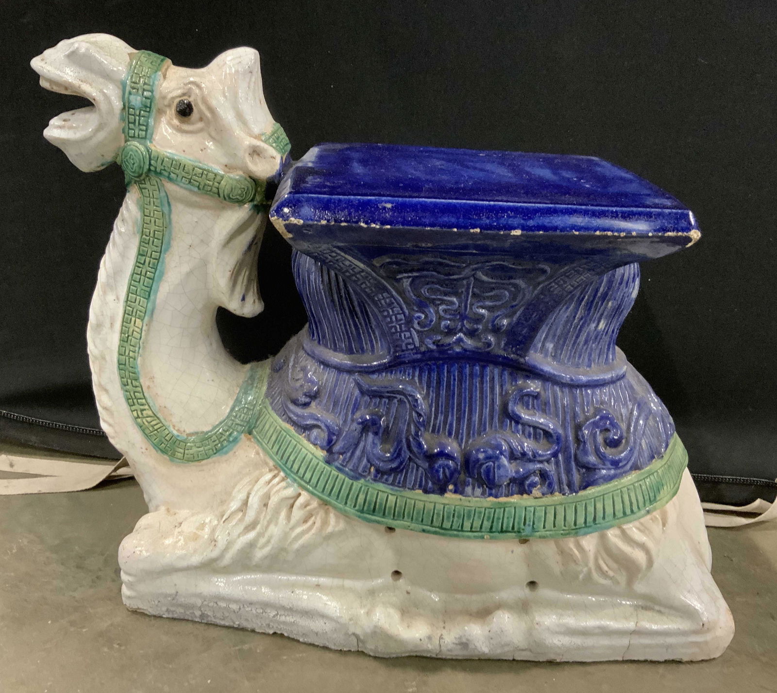 Pair Painted Vintage Porcelain Camel Garden Stools: Camel figures are vintage & porcelain. Each appears to be hand painted. Each measures approx 15 inches tall 19 inches deep 9 inches wide. Side tables, end tables, decorative objects, porcelain decor h