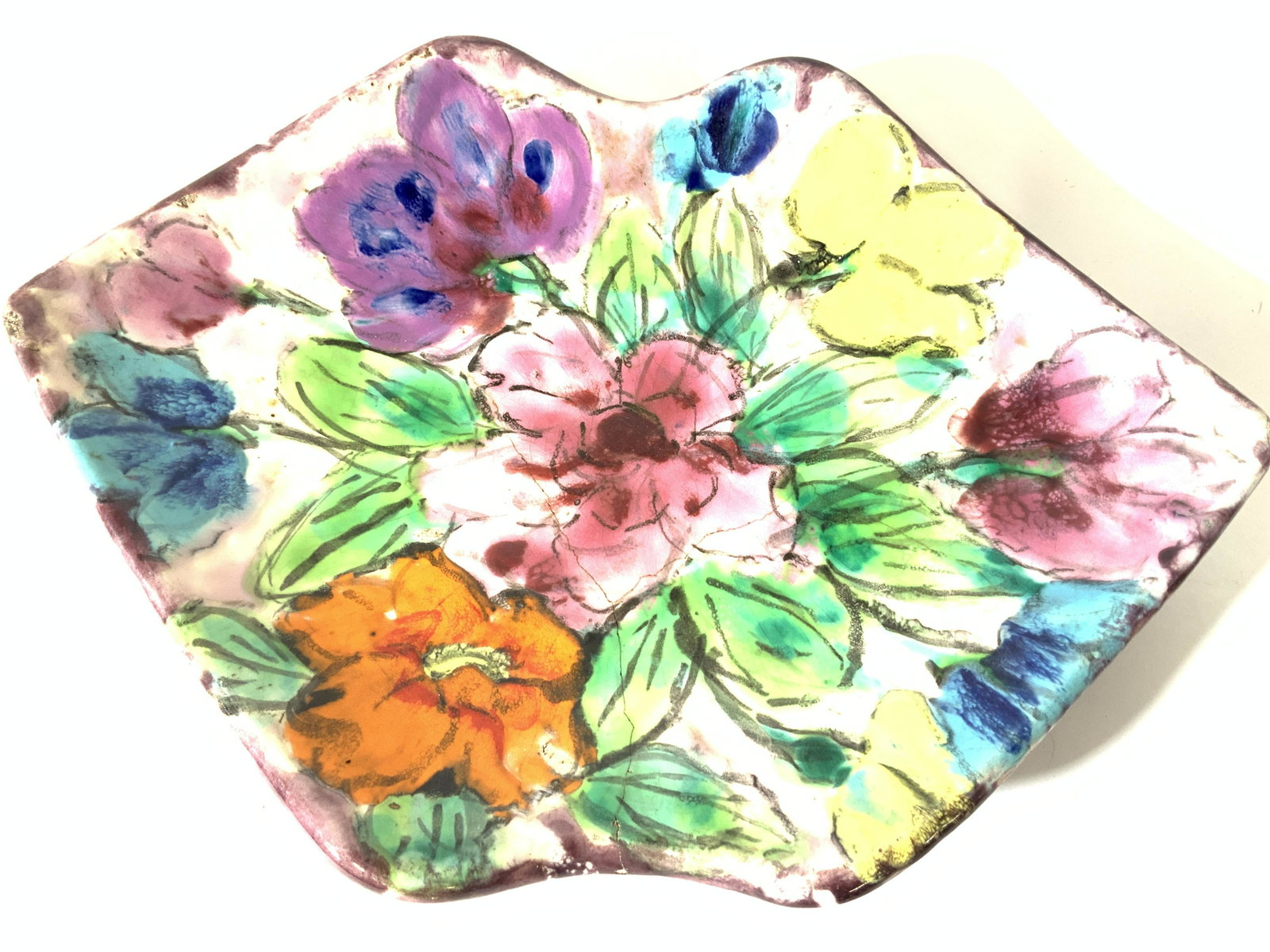 ROSSELLO VALLAURIS Signed Ceramic Floral Plate: Céramique signé ROSSELLO VALLAURIS décor. Vintage, hand made, hand painted, Marked underside with artist impressed stamped name and signature Mark. Cracks to piece consistent with age and exposure.