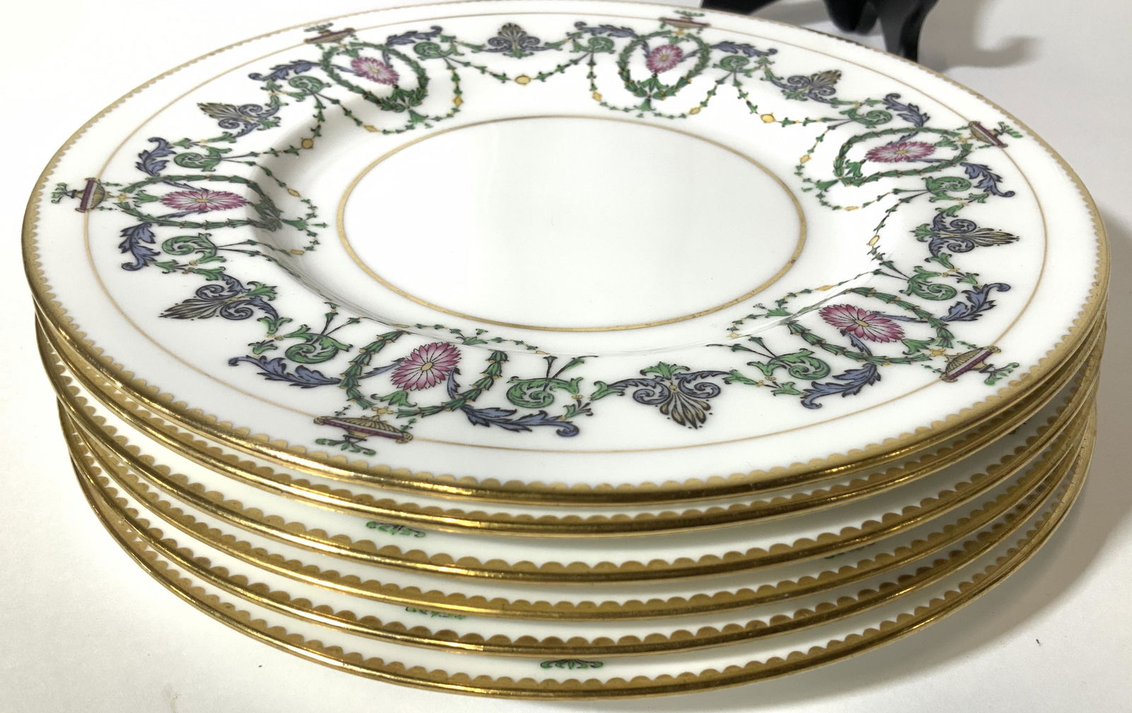 SET 6 MINTONS George Watts Porcelain Plates: Hallmarked Plates, reads MINTONS George Watts Milwaukee, Wis. Pat.Apr 1st, 1913, Rd No 608547, 73793. Beautiful scalloped gilt rim. Classic Victorian pattern. Signed and numbered by artist. 8.75 in. R