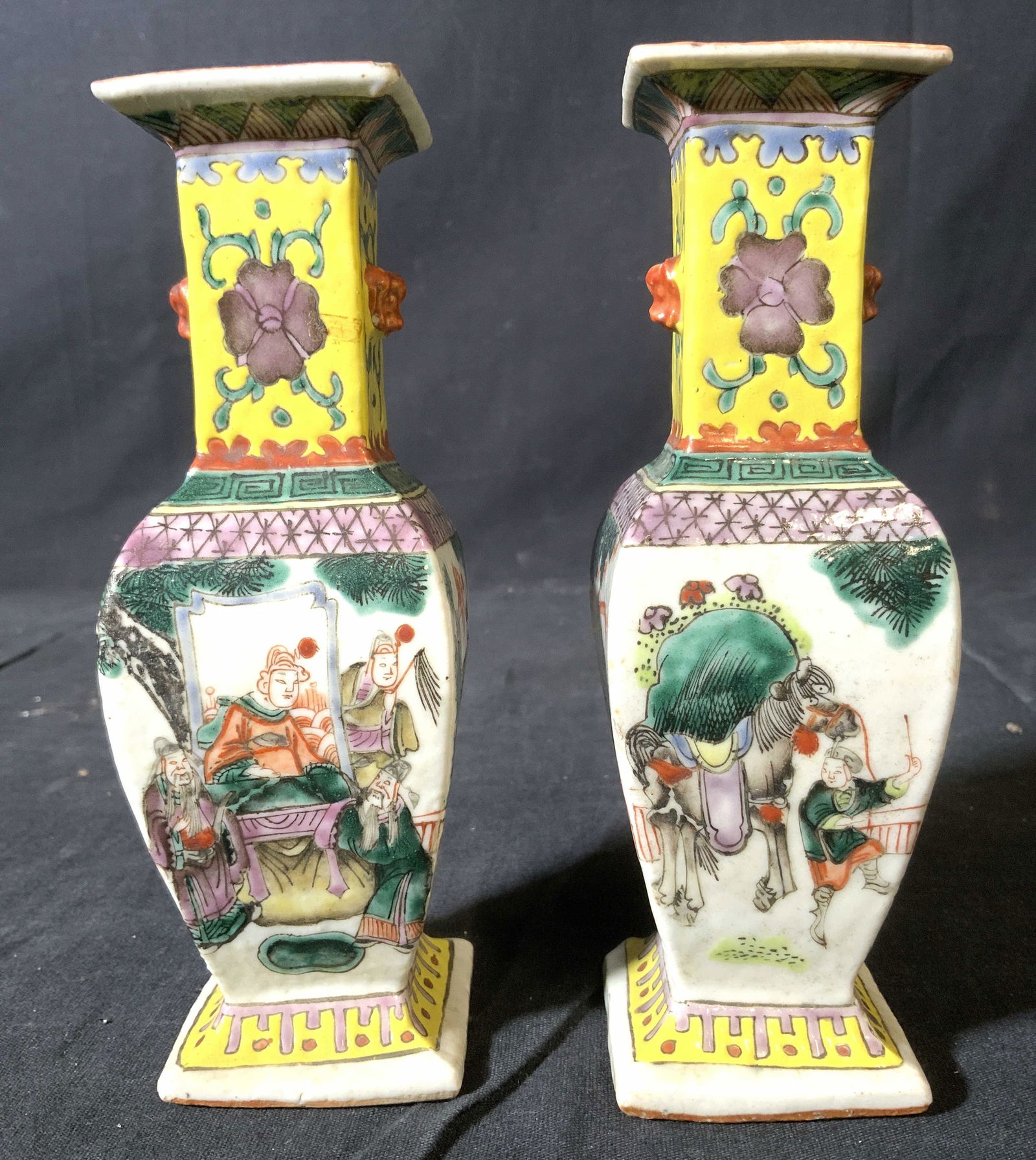 Pair Vntg FAMILLE JAUNE Painted Chinoiserie Vases: Lot includes 2 vases. set asian vases, Each are FAMILLE JAUNE. Vases are vintage possibly antique. Each are hand painted with intricate multi toned floral leaf no geometric detail. Each piece also has
