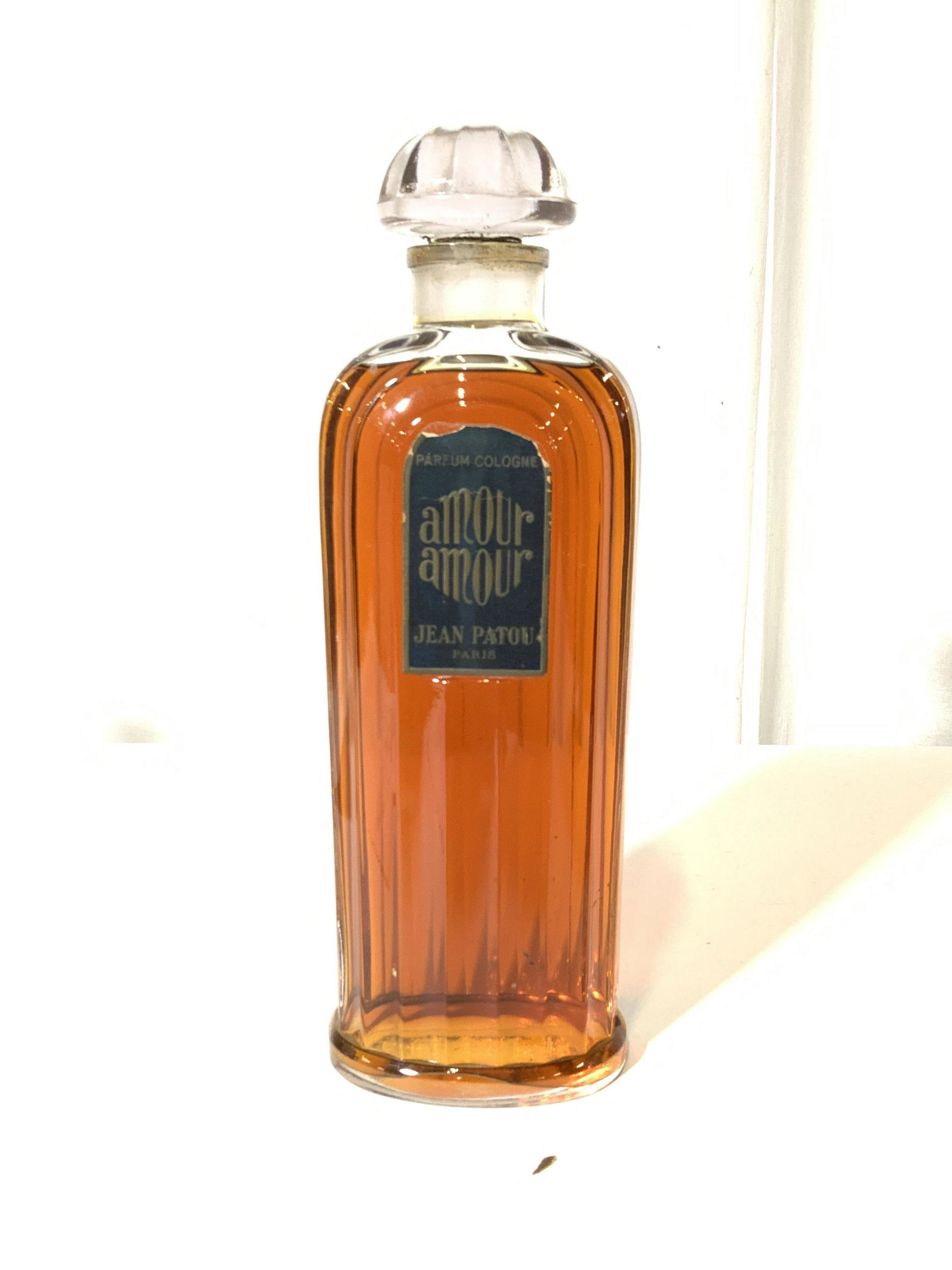 Jean PATOU Paris Oversized Display Perfume Bottle: JEAN PATOU is best known for his landmark woman's fragrance, Joy, marketed in 1929 as the ‘most costly perfume in the world’. By 1924, he was an established French fashion leader along with Chanel