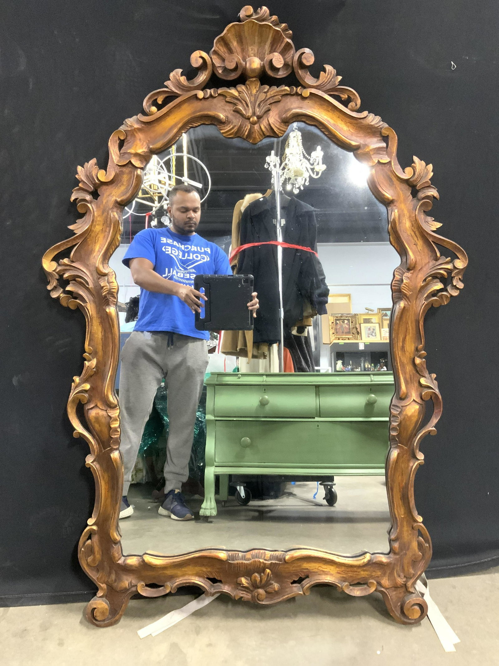 Vintage Ornate Gold Leaf Victorian Wall Mirror: Mirror is vintage possibly antique. Piece has intricately detailed ornate gold toned frame possibly gold leaf with c and s scroll detail. Piece measures approx 57 inches tall 39 inches wide. Mirror ha