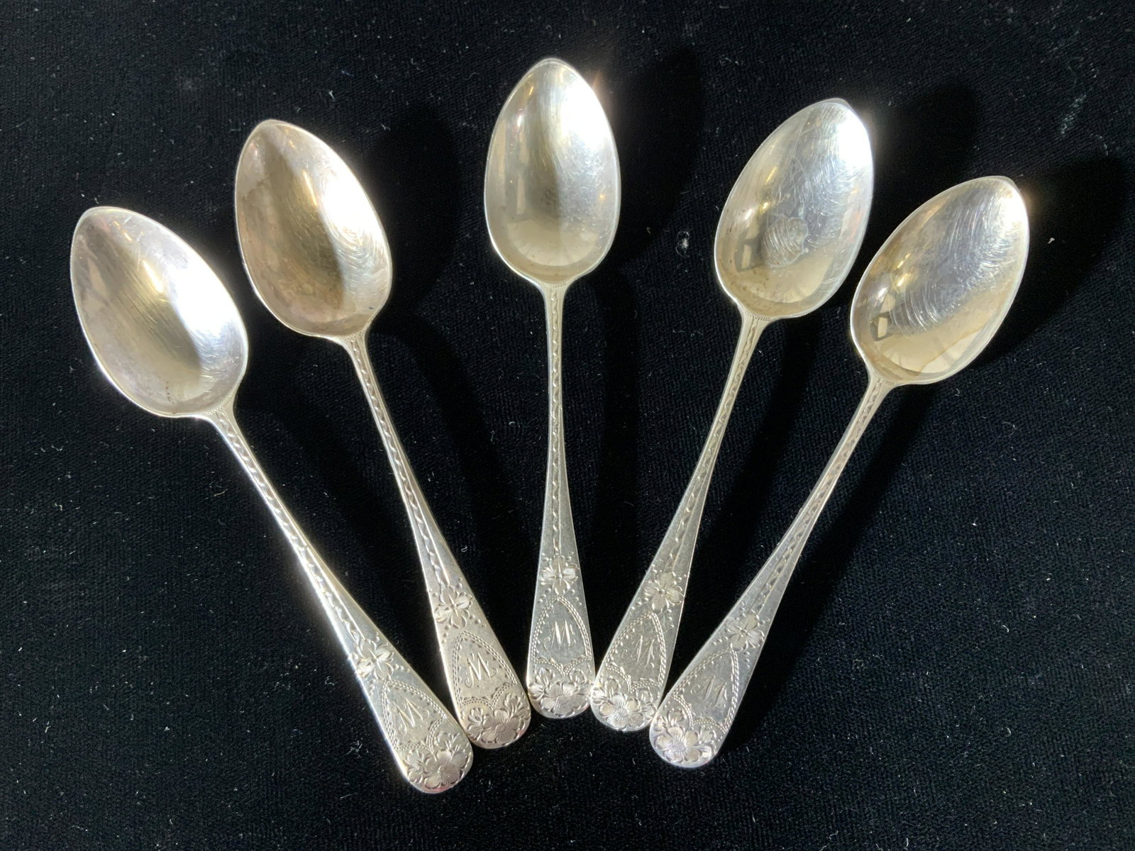 Set 5 CSH Hallmarked SILVER Espresso Spoons: 4.5 in. Demitasse/ espresso/ sugar spoons. Hallmarked CHS with trademarks for Sterling- lion, panther and letter C. Art Nouveau design handles, etched flowers and swirls, monogrammed M. 2.10 ozt. Prop