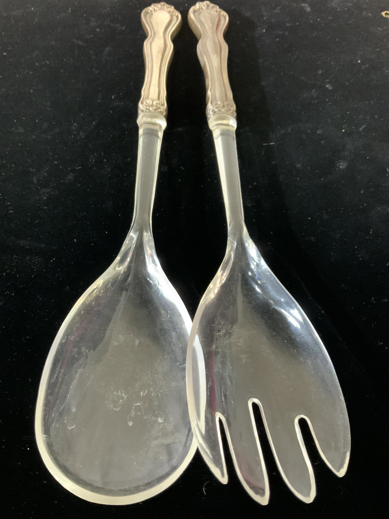 Sterling Silver & Lucite Salad Mixers: Ornate Embossed Sterling Silver Victorian Style Handle with lucite salad scooped fork and spoon. No markings on silver noted, possibly antique, certainly vintage. Possibly handles refitted with lucite
