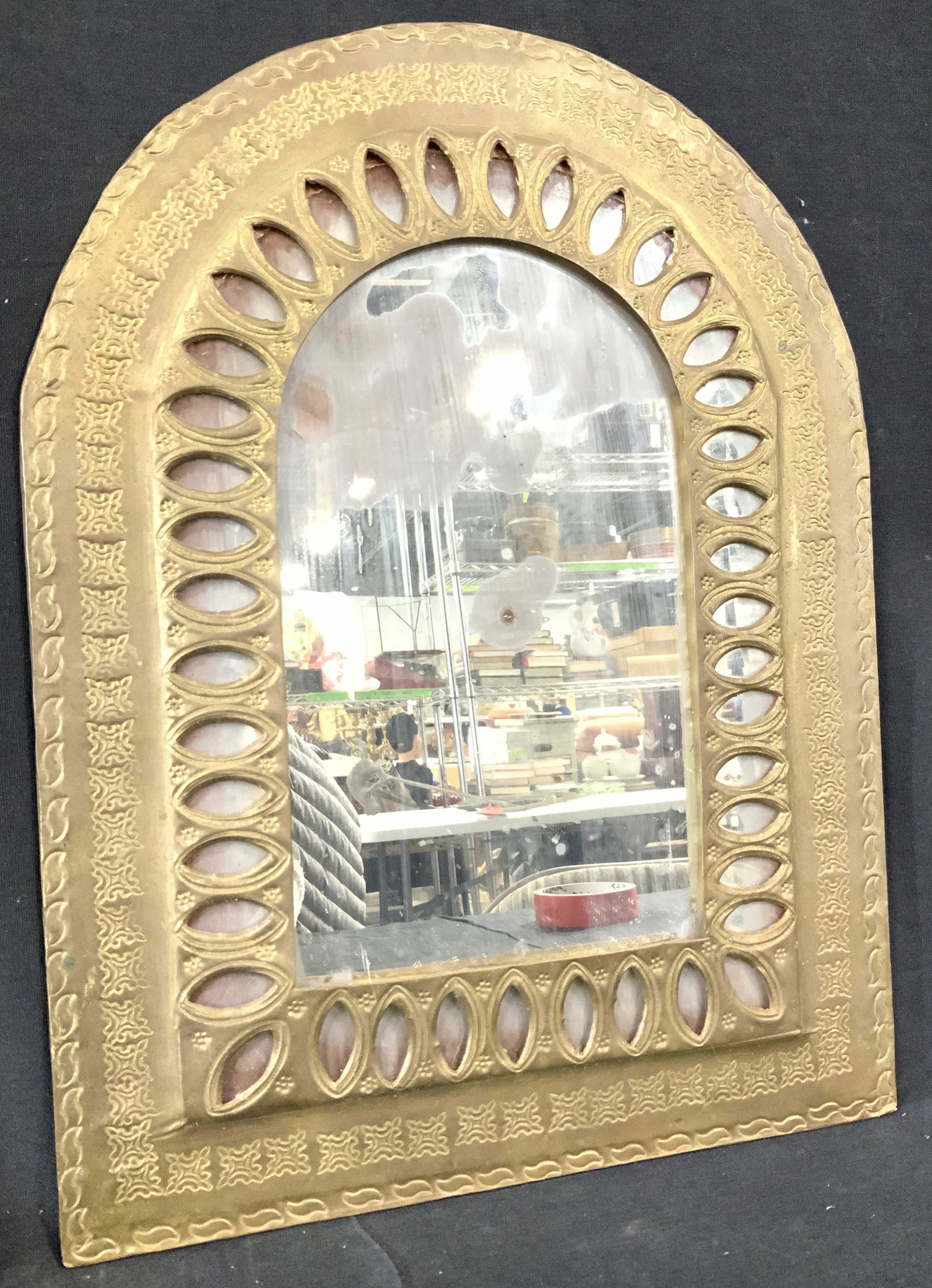 Byzantine Style Arts Hand Crafted Wall Mirror: Lightweight mirror, handmade with a tin style metal in brass tone, which is etched with a reticulated ornate design. Covers many historical architectural cultures. Metal is folded over backside. Mirro