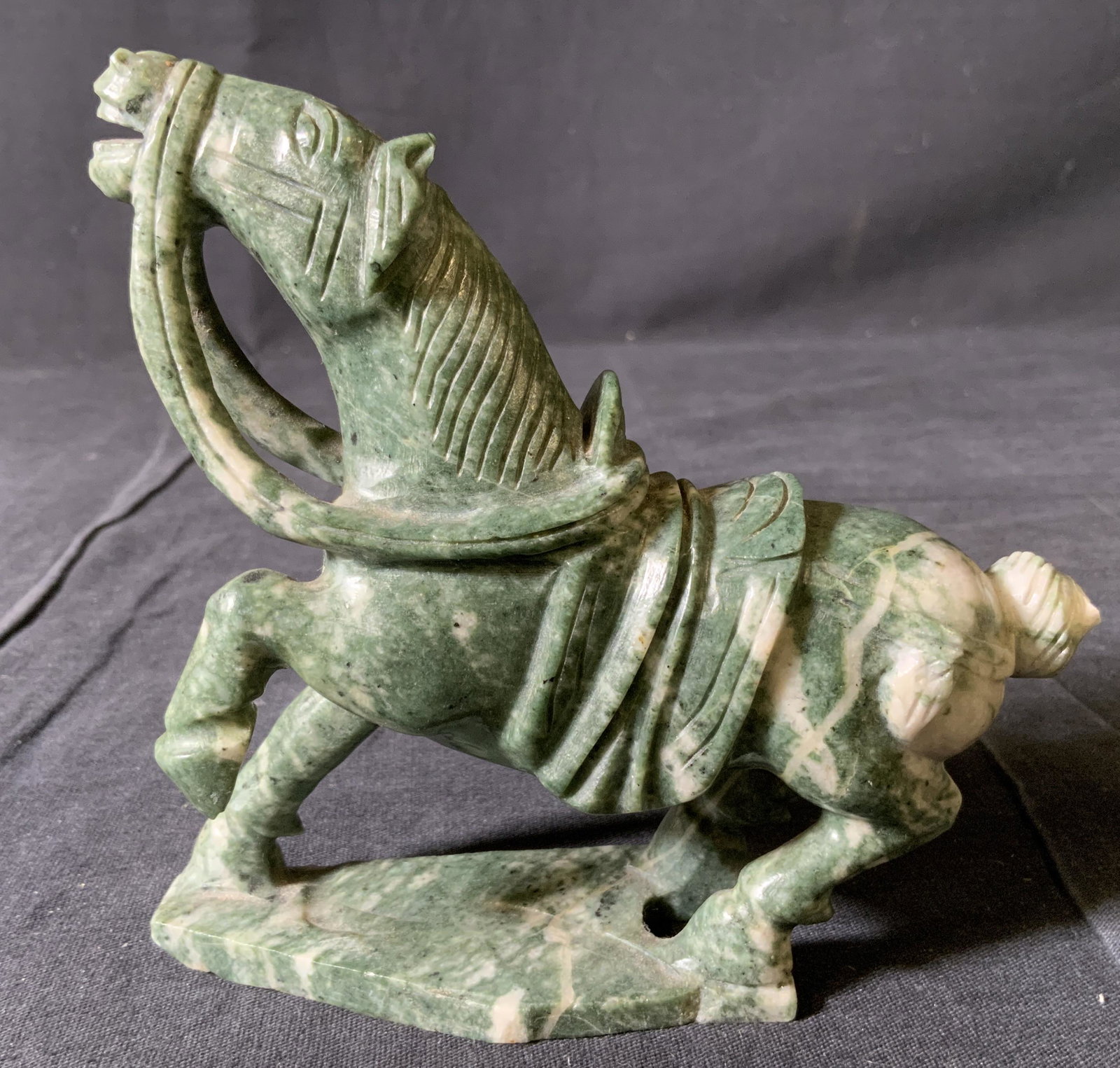 Jadeite Horse Carved Figural: Jadeite Horse Figurine, no apparent inscriptions or marks, a rearing horse, measures 4 5/8 inches tall x 4 7/8 inches wide, some surface wear and missing tail, Property of Janine Metz estate, social s