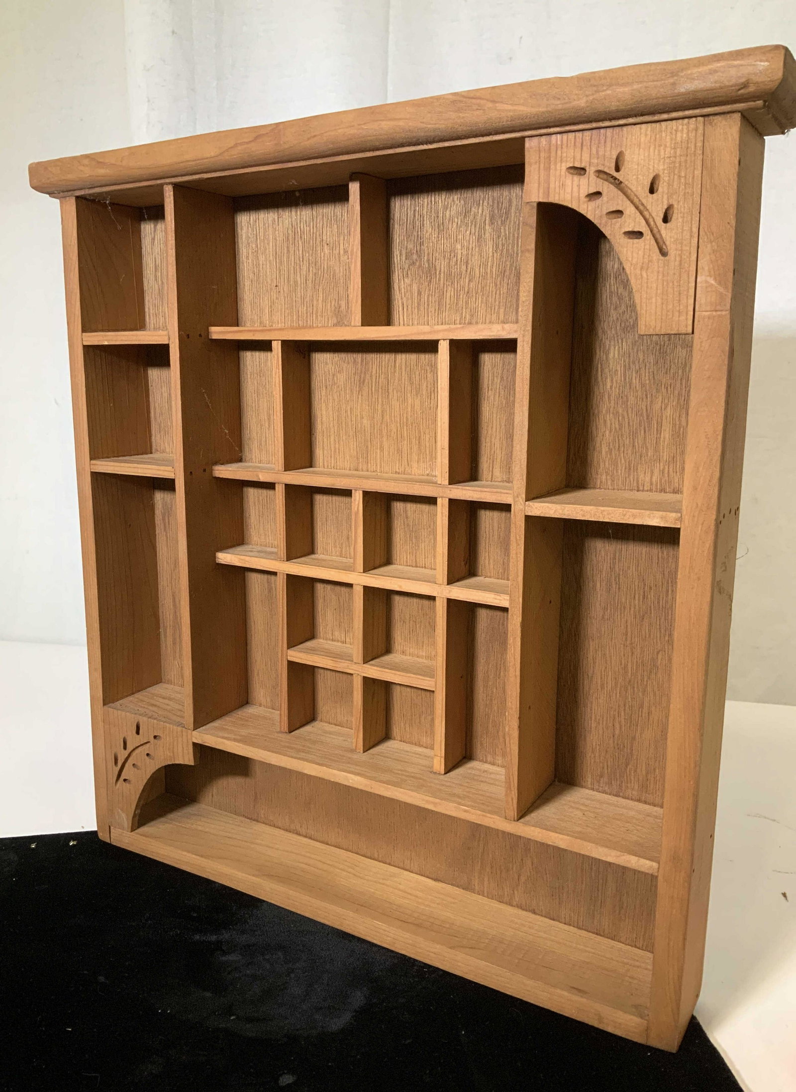 Hand Crafted Wood What Not Shelf: Medium colored wood, country feel, individual box shelf compartments to display collectible items. Can stand against wall on table or hang on wall. Ht 16.25 in. Width 14 3/8 in. Depth 2 in. Lightweigh