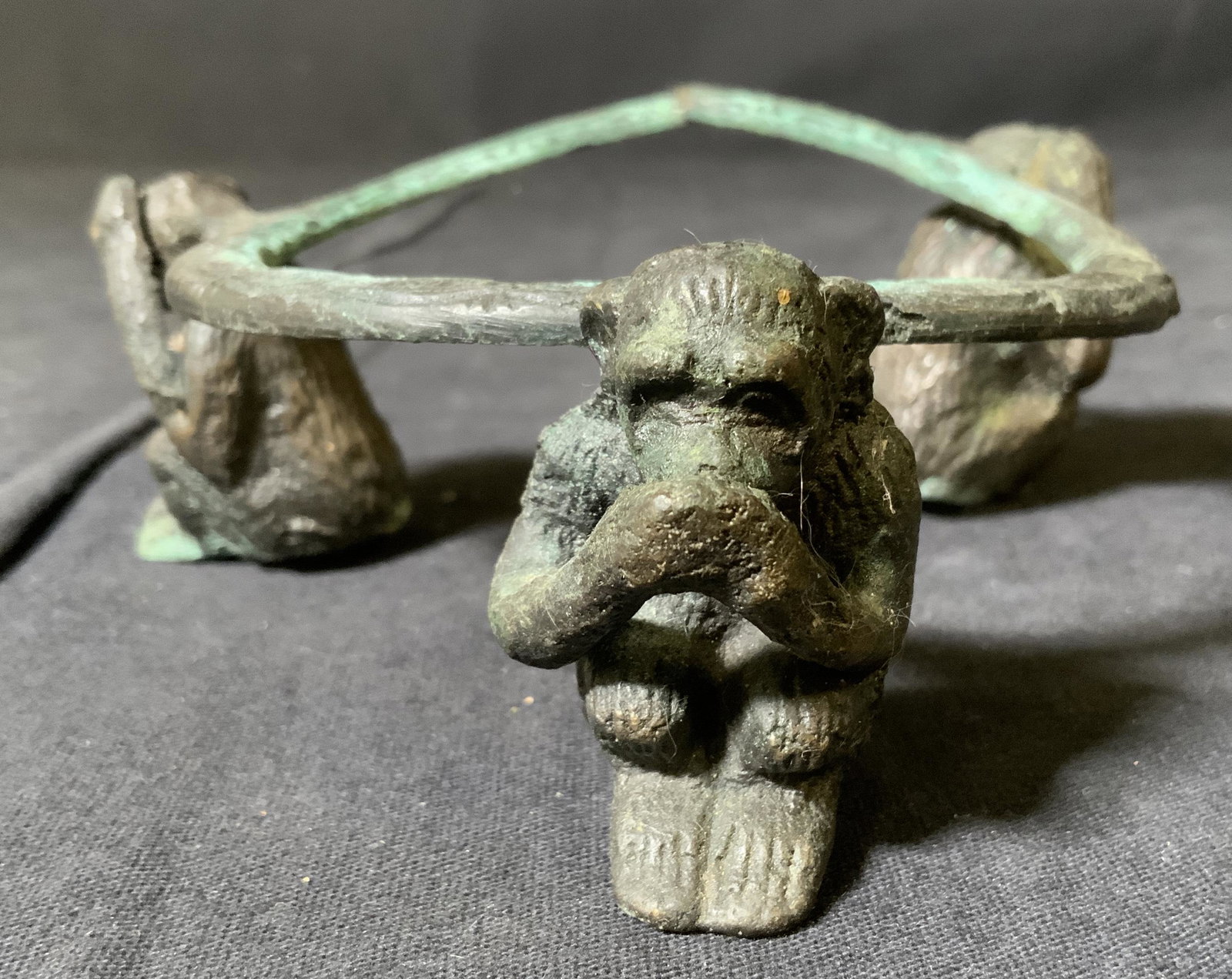 Vintage Cast Iron Monkey Stand: Vintage Cast Iron Monkey Stand, no apparent inscriptions or marks, seated monkeys in see no evil, speak no evil, hear no evil positions, measures 1 3/4 inches tall x 4 5/8 inches at widest point, rust