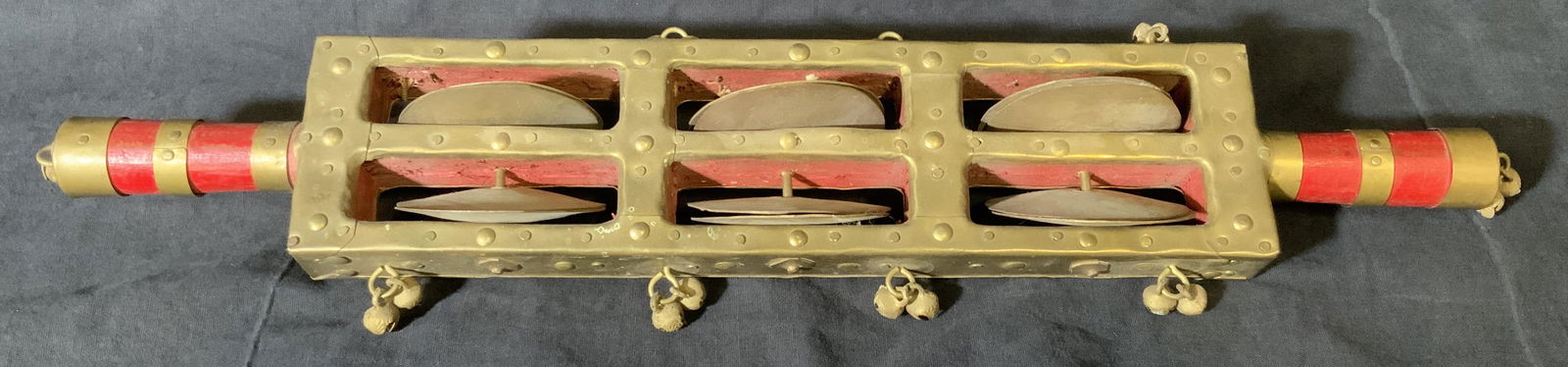 Vintage Bell & Tambourine Stick: Vintage possibly antique bell and tambourine stick, no apparent inscriptions or markings, made of red painted wood and brass colored metal, piece consists of six sections of tambourine plates and a ha