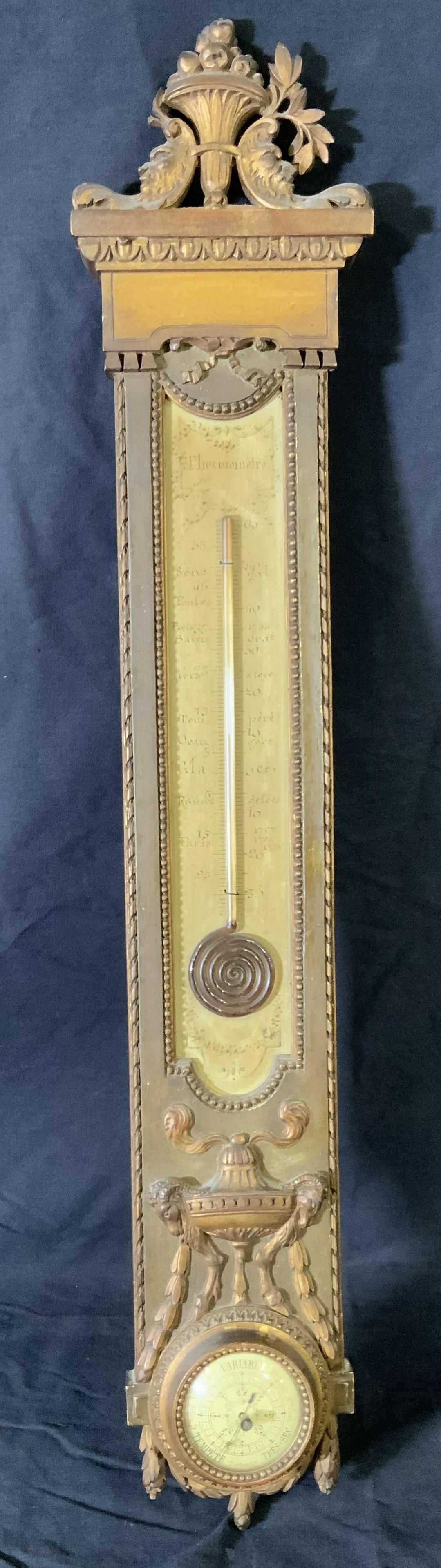 Vintage French Thermometer & Barometer: Vintage French Thermometer & Barometer, vintage possibly antique, inscriptions to piece in French, measures 27 5/8 x 5 1/4 inches at widest point, upper portion of wooden decoration missing, wear to p