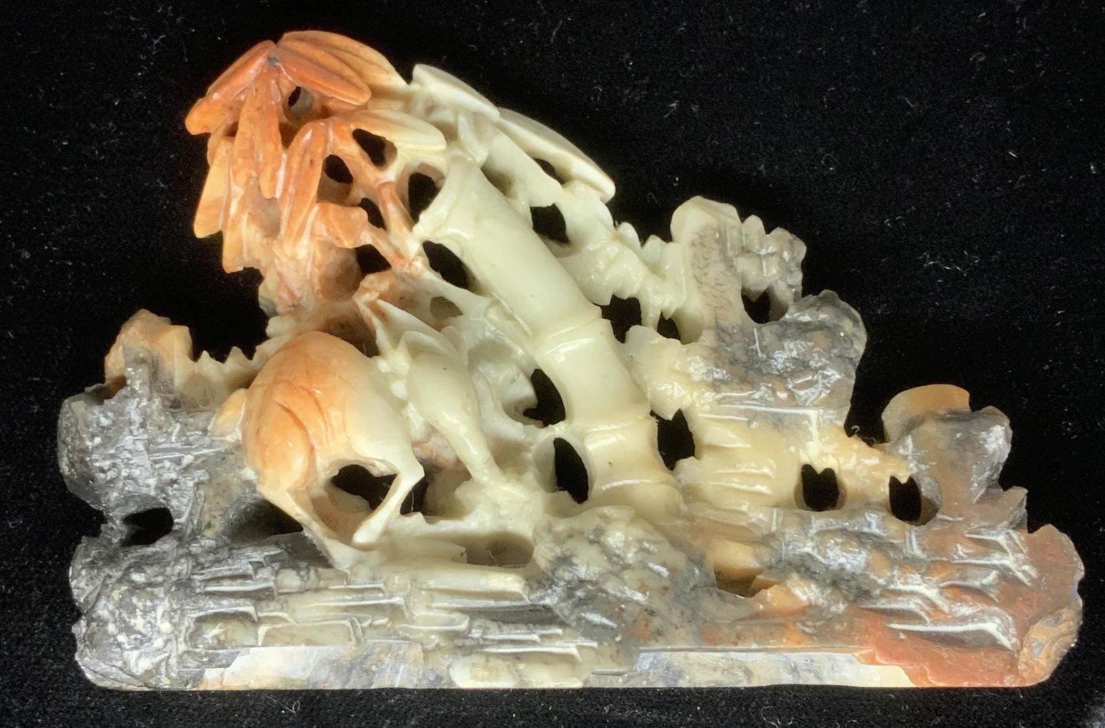 Vintage Chinese Multi Color Soapstone Sculpture: A collectible. Hand carved antique Soapstone, celadon coloring fading to deep mixed color. sticker on back reads c. 1900 & soapstone Hand Carved decorative object depicting jungle trees and animal amo