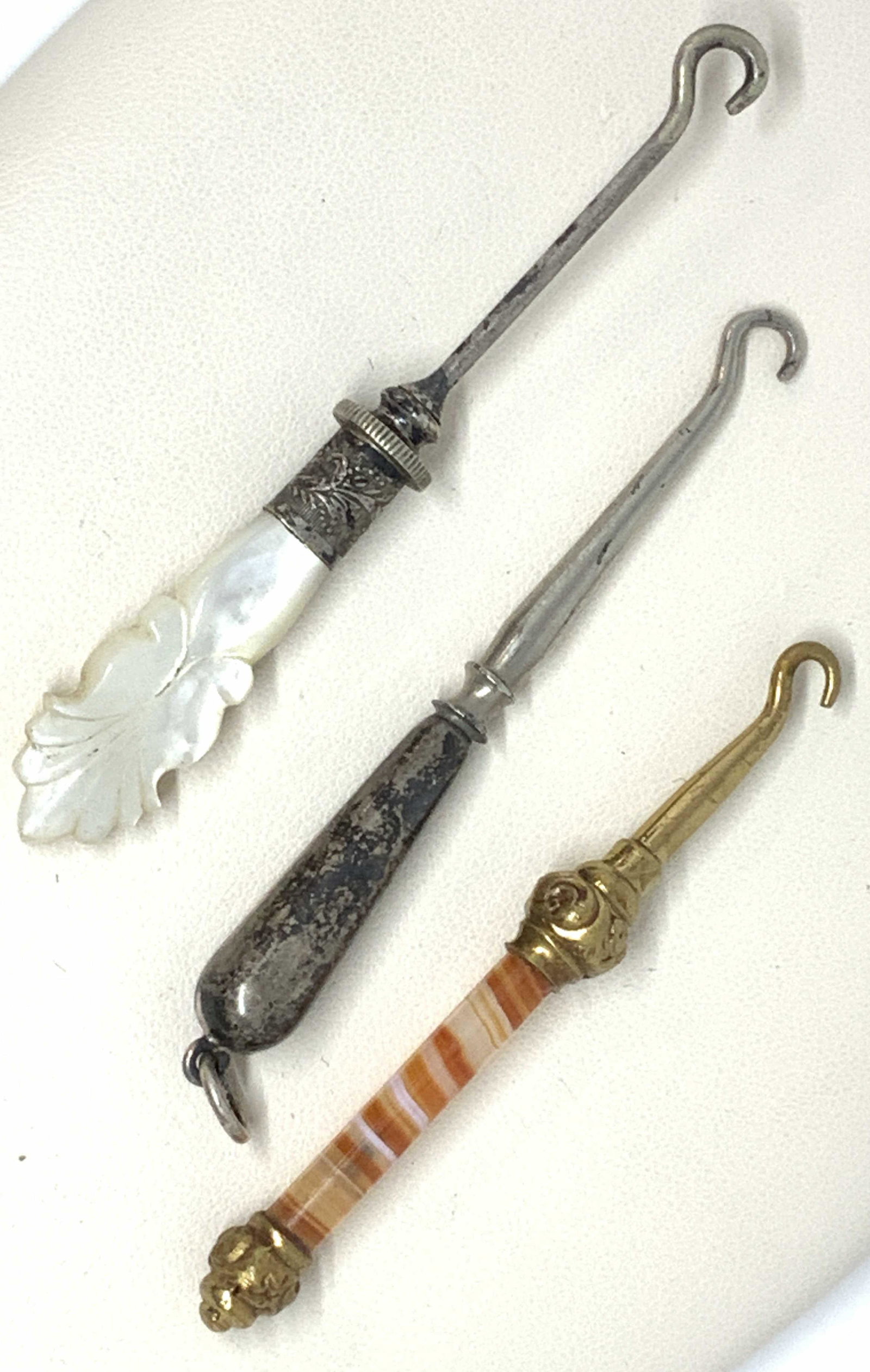 Grp3 Collectible Antique Button Hooks, Luxury: Antique Victorian Era Button hooks, often known as GLOVE HOOKS were used for buttons on dresses, sleeves and men's stiff collars. Many glovehooks have a small ring on the handle end for a lady to atta