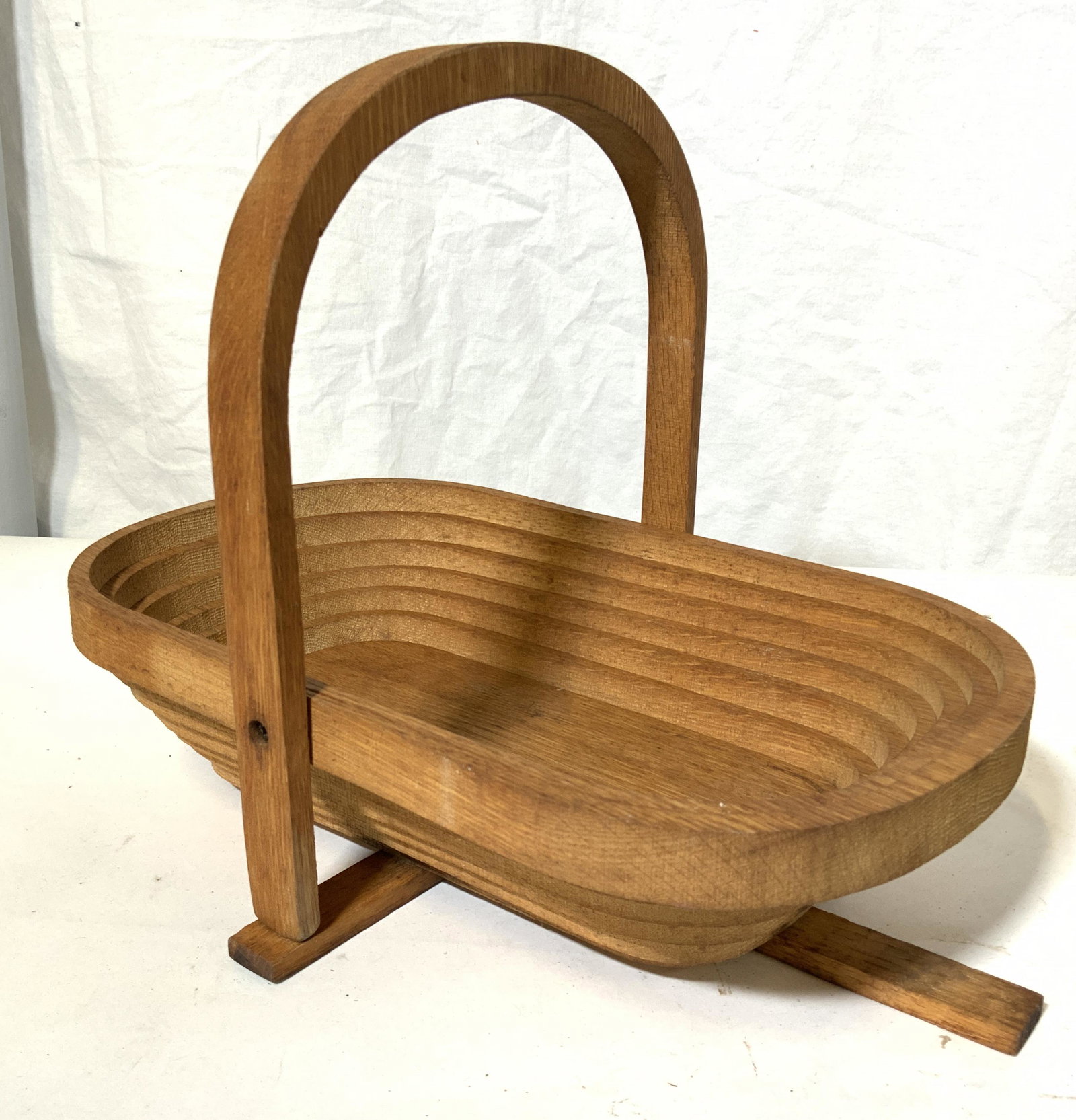 Lot 3 Teakwood & Other Wooden Accessories: Lot includes 1 teakwood bowl marked PLUM DOUG GORDON NELSON N.Z. 1 folding basket which also can be used as triveta, & 1 pot trivet. Trivet hand hand painted detail of swimming duck. Basket measures a