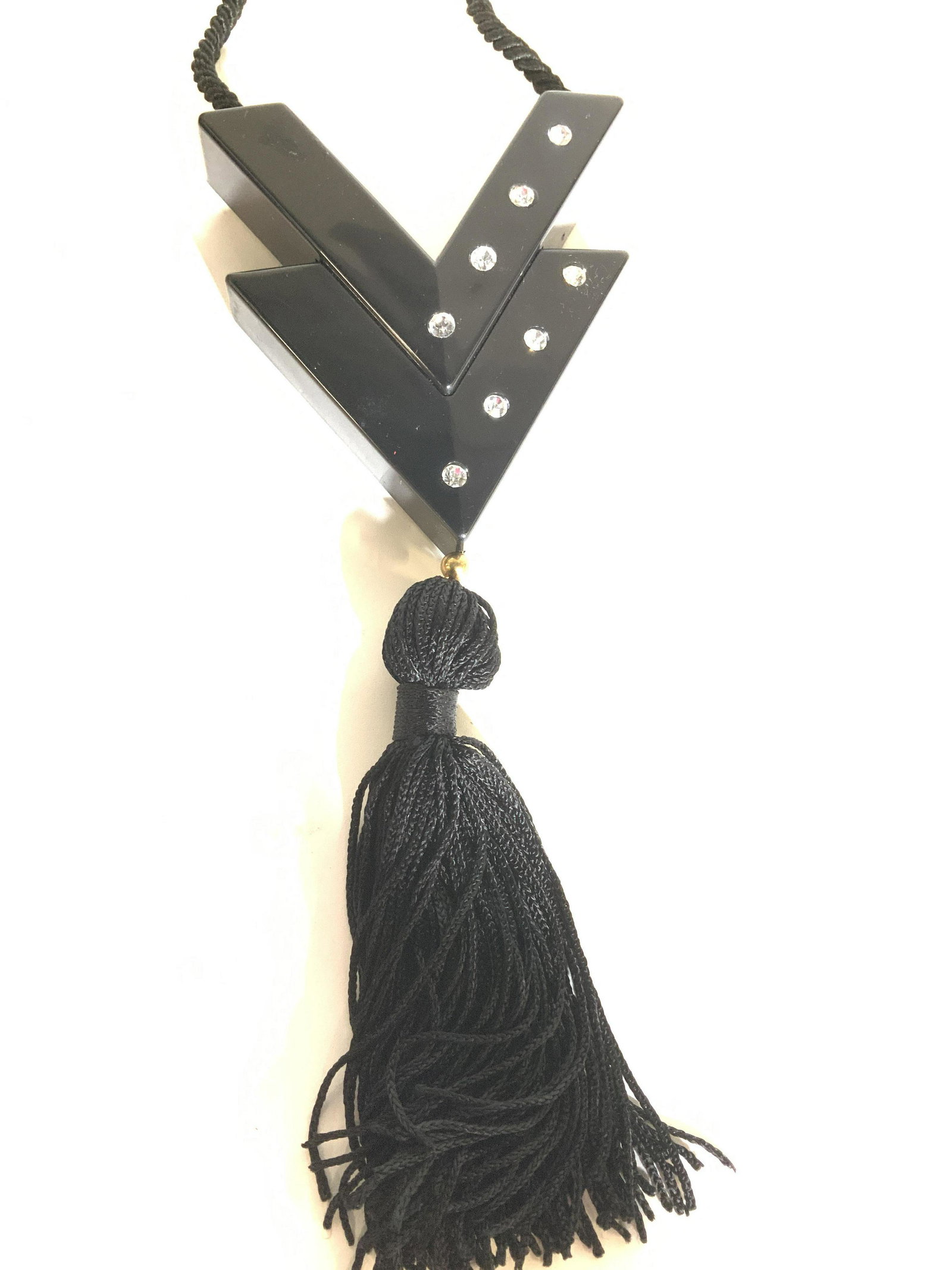 BLK LUCUTE Double V Designer Accessory, Necklace: Tassel ornament attached to a double V that has rhinestones, long rope attached.rope 16.5 in. V decor with tassel 8 in. Long. Many current uses- jewelry, curtain tie back, home decor, wearable belt ac