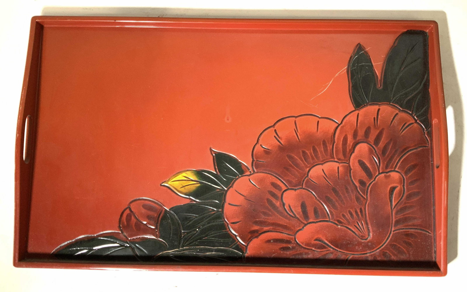 Artist Signed Asian Red Lacquer Tray: Gallery tray, serving tray, decorative table ware, bar ware, signed underside with Asian characters, etched floral design, measures app 21.5 by 12.5 inches ht 2 inches, Asian decorative arts, property