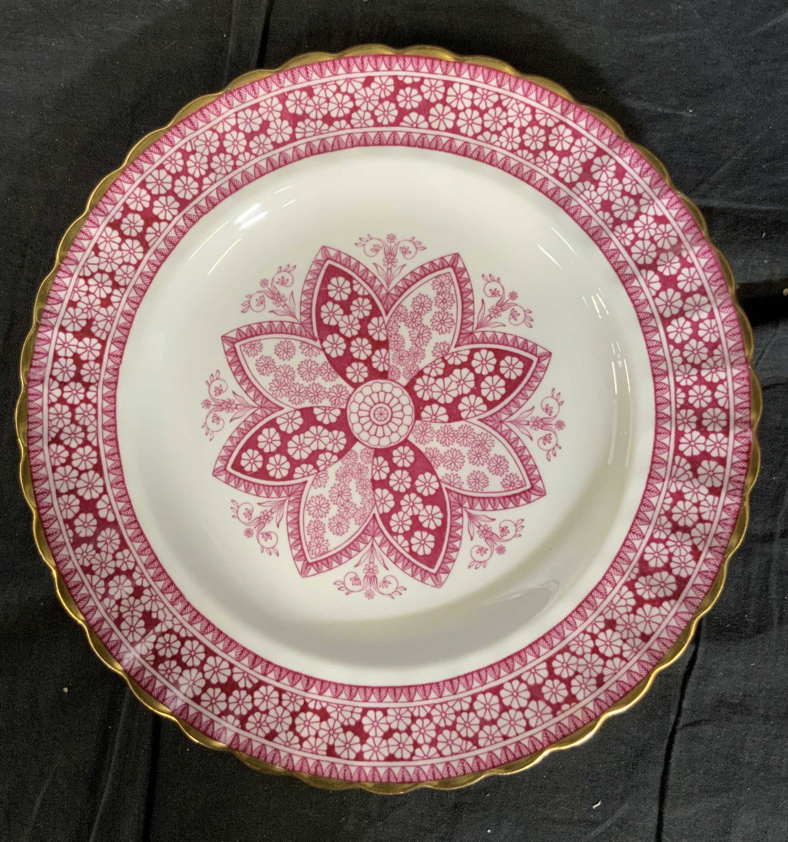 English SPODE Porcelain Primrose Plate: English Spode porcelain in primrose pattern gilded edges punks reds floral geometric, measures diameter 10.5 inches, hallmarked signed underside, English porcelain tableware, English bone China, prope